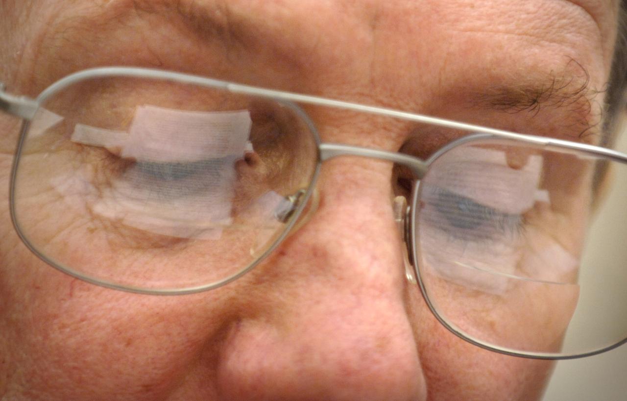 NASA Administrator Michael Griffin reads from his written testimony while testifying in front of a hearing before the House Science & Technology Committee  regarding NASA's FY 2007 budget request, Thursday, Feb., 16, 2006, in Washington. Photo Credit: (NASA/Bill Ingalls)