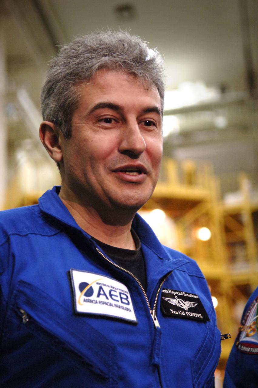 Astronaut Marcos Pontes, Brazilian Space Agency Soyuz crew member who will spend 10 days aboard the International Space Station under an agreement with the Russian Federal Space Agency, talks with members of the media after a final Soyuz check at building 254 of the Baikonur Cosmodrome in Baikonur, Kazakhstan. Sunday, March 26, 2006. Photo Credit: (NASA/Bill Ingalls)