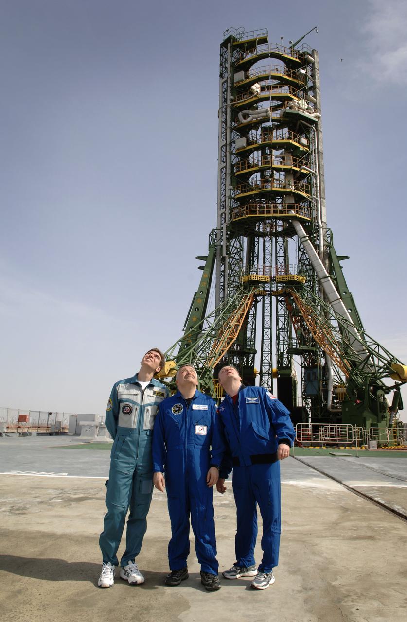 Expedition 13 backup crew members, Sergei Volkov, left, Russia’s Federal Space Agency Soyuz crew member; Fyodor N. Yurchikhin, Russia’s Federal Space Agency Commander; and Michael Fincke, right, Science Officer and Flight Engineer, during a tour of the Soyuz launch pad at the Baikonur Cosmodrome in Baikonur, Kazakhstan. Sunday, March 26, 2006. Photo Credit: (NASA/Bill Ingalls)