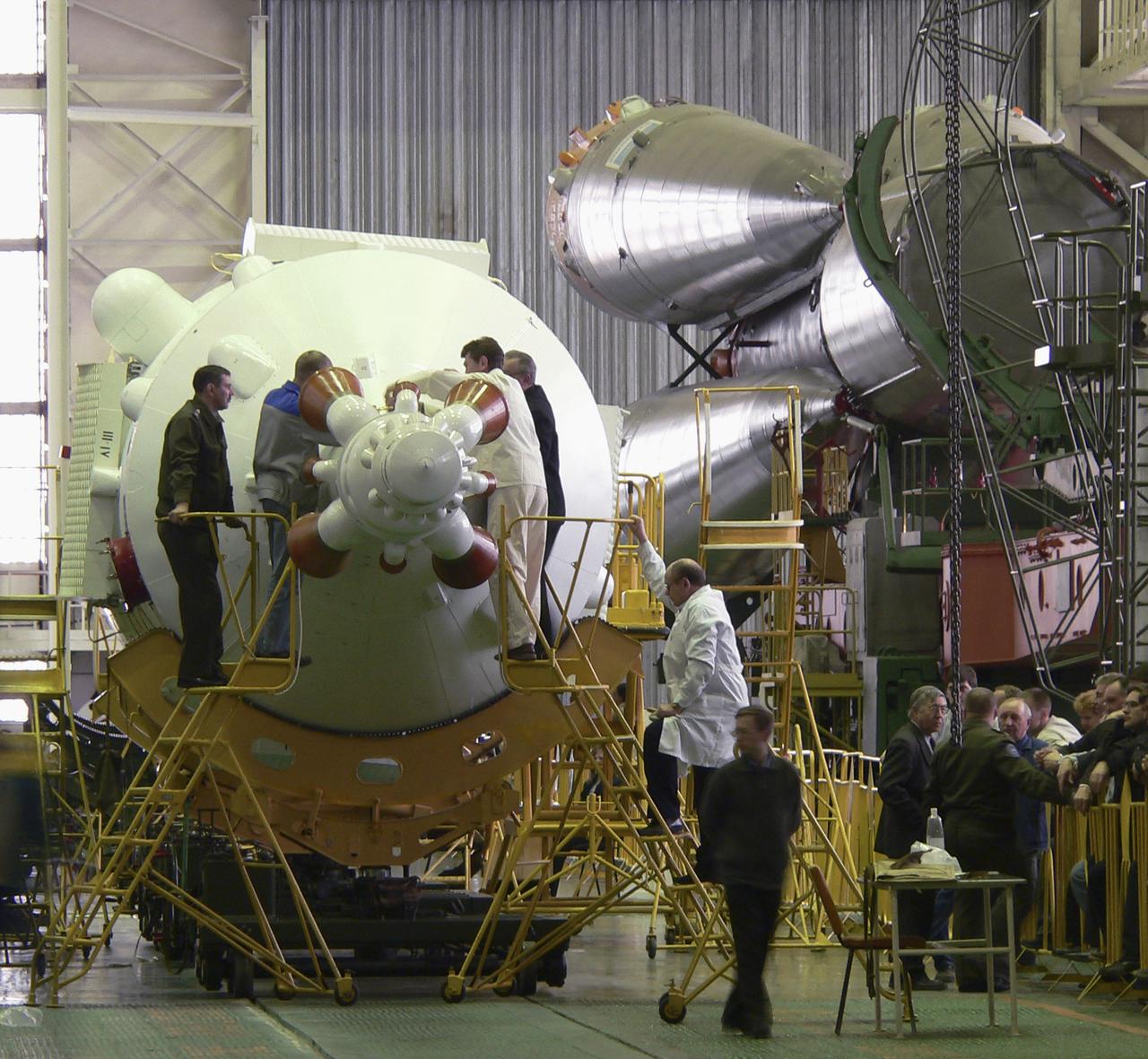 The Soyuz TMA-8 capsule was mated Monday, March 27, 2006, to its booster in preparation for the launch on March 30, 2006 carrying Expedition 13 crew members, Jeffrey N. Williams, Science Officer and Flight Engineer; Pavel V. Vinogradov, Russia’s Federal Space Agency International Space Station Commander; and Marcos Pontes, Brazilian Space Agency Soyuz crew member. Baikonur Cosmodrome in Baikonur, Kazakhstan. Photo Credit: (NASA/Victor Zelentsov)
