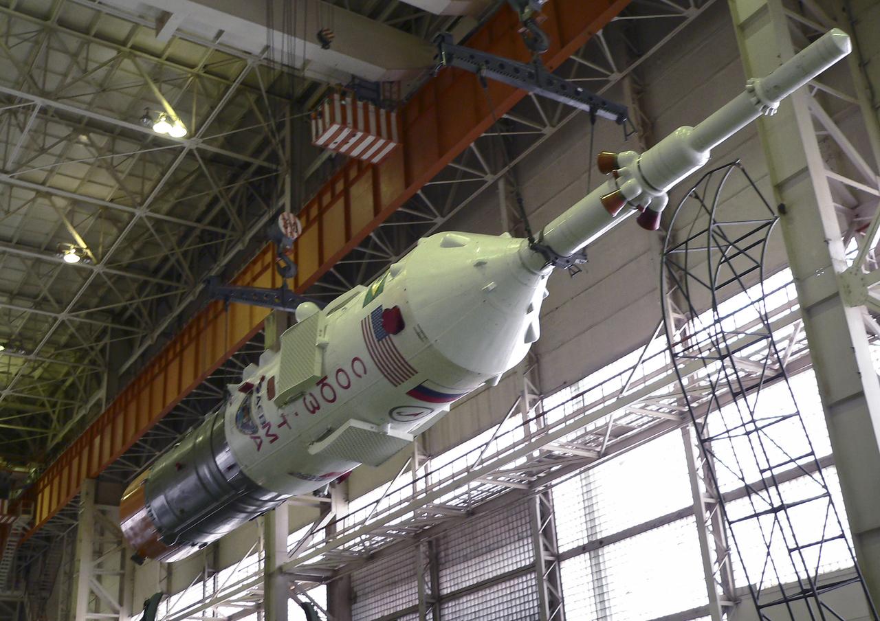 The Soyuz TMA-8 capsule was mated Monday, March 27, 2006, to its booster in preparation for the launch on March 30, 2006 carrying Expedition 13 crew members, Jeffrey N. Williams, Science Officer and Flight Engineer; Pavel V. Vinogradov, Russia’s Federal Space Agency International Space Station Commander; and Marcos Pontes, Brazilian Space Agency Soyuz crew member. Baikonur Cosmodrome in Baikonur, Kazakhstan. Photo Credit: (NASA/Victor Zelentsov)