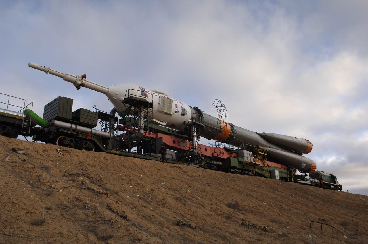 The Soyuz TMA-8 spacecraft and its booster rolled out to the launch pad on Tuesday, March 28, 2006 at the Baikonur Cosmodrome in Baikonur, Kazakhstan for final pre-launch preparations. The Soyuz will blast off on March 30, 2006 to carry Expedition 13 Commander Pavel V. Vinogradov and Science Officer and Flight Engineer Jeffrey N. Williams to the International Space Station for a six-month mission. The spacecraft will also be carrying Brazilian Space Agency Soyuz crew member Marcos Pontes, who will spend 10 days aboard the International Space Station under an agreement with the Russian Federal Space Agency. Photo Credit: (NASA/Bill Ingalls)