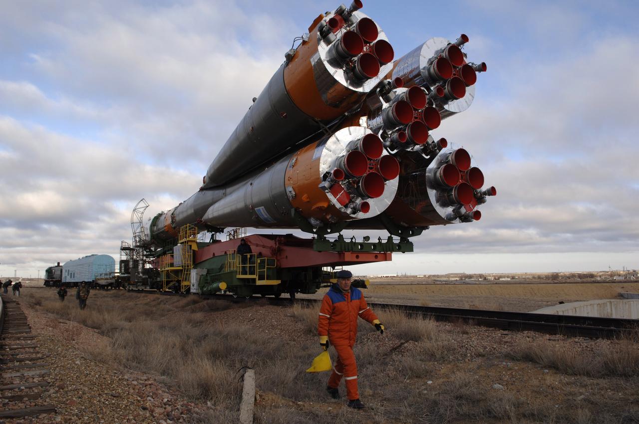 The Soyuz TMA-8 spacecraft and its booster rolled out to the launch pad on Tuesday, March 28, 2006 at the Baikonur Cosmodrome in Baikonur, Kazakhstan for final pre-launch preparations. The Soyuz will blast off on March 30, 2006 to carry Expedition 13 Commander Pavel V. Vinogradov and Science Officer and Flight Engineer Jeffrey N. Williams to the International Space Station for a six-month mission. The spacecraft will also be carrying Brazilian Space Agency Soyuz crew member Marcos Pontes, who will spend 10 days aboard the International Space Station under an agreement with the Russian Federal Space Agency. Photo Credit: (NASA/Bill Ingalls) The Soyuz TMA-8 spacecraft and its booster rolled out to the launch pad on Tuesday, March 28, 2006 at the Baikonur Cosmodrome in Baikonur, Kazakhstan for final pre-launch preparations. The Soyuz will blast off on March 30, 2006 to carry Expedition 13 Commander Pavel V. Vinogradov and Science Officer and Flight Engineer Jeffrey N. Williams to the International Space Station for a six-month mission. The spacecraft will also be carrying Brazilian Space Agency Soyuz crew member Marcos Pontes, who will spend 10 days aboard the International Space Station under an agreement with the Russian Federal Space Agency. Photo Credit: (NASA/Bill Ingalls)