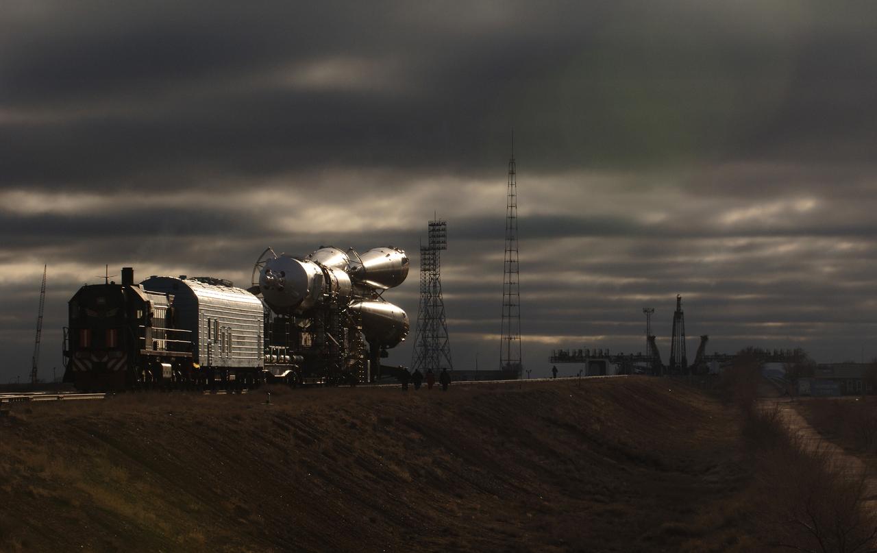 The Soyuz TMA-8 spacecraft and its booster rolled out to the launch pad on Tuesday, March 28, 2006 at the Baikonur Cosmodrome in Baikonur, Kazakhstan for final pre-launch preparations. The Soyuz will blast off on March 30, 2006 to carry Expedition 13 Commander Pavel V. Vinogradov and Science Officer and Flight Engineer Jeffrey N. Williams to the International Space Station for a six-month mission. The spacecraft will also be carrying Brazilian Space Agency Soyuz crew member Marcos Pontes, who will spend 10 days aboard the International Space Station under an agreement with the Russian Federal Space Agency. Photo Credit: (NASA/Bill Ingalls)