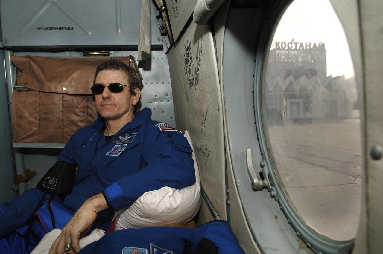 Expedition 12 Commander and International Space Station Science Officer, Bill McArthur waits onboard a helicopter before transferring to an airplane and a flight back to Moscow from Kustanay, Kazakhstan. Expedition 12 returned to Earth and landed in the steppes of Kazakhstan. The Soyuz TMA-7 spacecraft touched down at 7:48 p.m. EDT, Sunday, April 9, 2006. Returning with Commander Bill McArthur were Flight Engineer Valery Tokarev and Brazil’s first astronaut, Marcos Pontes, who arrived at the station with Expedition 13 on April 1. Photo Credit: (NASA/Bill Ingalls)