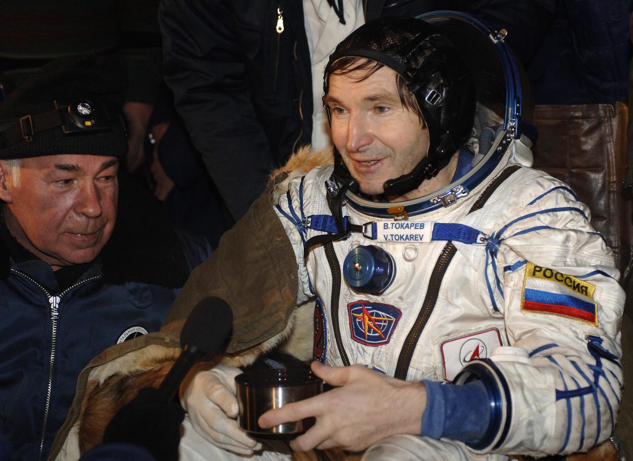Valery I. Tokarev, Soyuz Commander and Expedition 12 Flight Engineer, exchanges greetings with some of the crowd on hand in the steppes of Kazakhstan to meet the three crewmembers returning to Earth from the International Space Station in the Soyuz TMA-7 spacecraft on Sunday, April 9, 2006. Returning with Tokarev were Expedition 12 Commander Space Station Science Officer Bill McArthur and Brazil’s first astronaut, Marcos Pontes representing the Braizil Space Agency, who arrived at the station with Expedition 13 on April 1. Photo Credit: (NASA/Bill Ingalls)