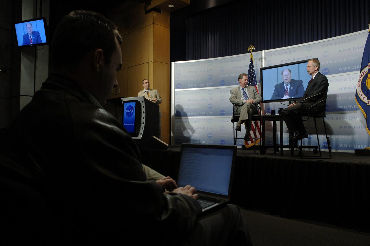 NASA Administrator Michael Griffin, second from left, and Associate Administrator for Space Operations William Gerstenmaier, right, look on as Space Shuttle Program Manager Wayne Hale speaks from NASA's Marshall Space Flight Center during a media briefing about the space shuttle program and processing for the STS-121 mission, Friday, April 28, 2006, at NASA Headquarters in Washington. Moderator Dean Acosta looks on af far left. Photo Credit (NASA/Bill Ingalls)