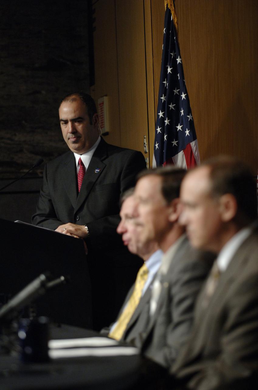 Dean Acosta, NASA Deputy Assistant Administrator and Press Secretary, left, moderates a NASA Update with NASA Administrator Michael Griffin, Scott J. Horowitz, NASA Associate Administrator for Exploration Systems and Jeff Hanley, Constellation Program Manager, right, on Wednesday, June 5, 2006, at NASA Headquarters in Washington. Photo Credit: (NASA/Bill Ingalls)