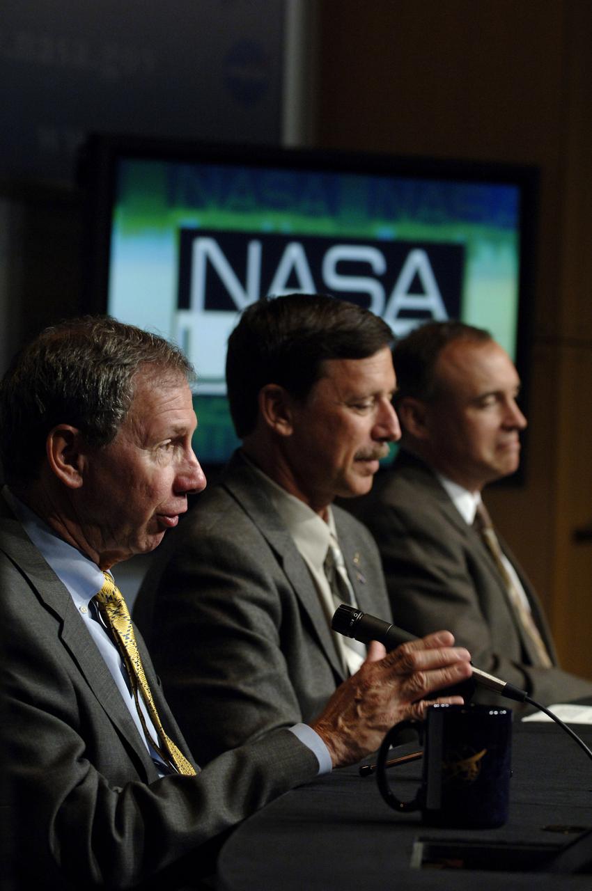 NASA Administrator Michael Griffin, left, announces to NASA employees and members of the media the responsibilities of the NASA centers associated with the Constellation Program for robotic and human Moon and Mars exploration on Wednesday, June 5, 2006, at NASA Headquarters in Washington. He is joined by Scott J. Horowitz, NASA Associate Administrator for Exploration Systems and Jeff Hanley, Constellation Program Manager, right. Photo Credit: (NASA/Bill Ingalls)