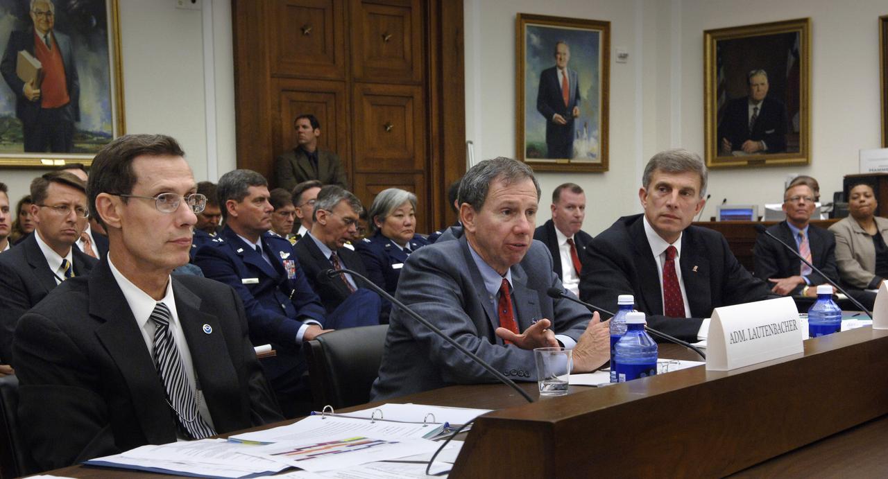 NOAA Administrator, Vice Admiral Conrad C. Lautenbacher, Jr., U.S. Navy (Ret.), left, NASA Administrator Michael Griffin and Under Secretary of the Air Force Dr. Ronald Sega, right, testify before the House Committee on Science and Technology regarding the future of the National Polar-orbiting Operational Environmental Satellite System (NPOESS) and results of the Nunn-McCurdy review of NOAA’s weather satellite program, Thursday, June 8, 2006, at the Rayburn House Office Building in Washington. Photo Credit: (NASA/Bill Ingalls)