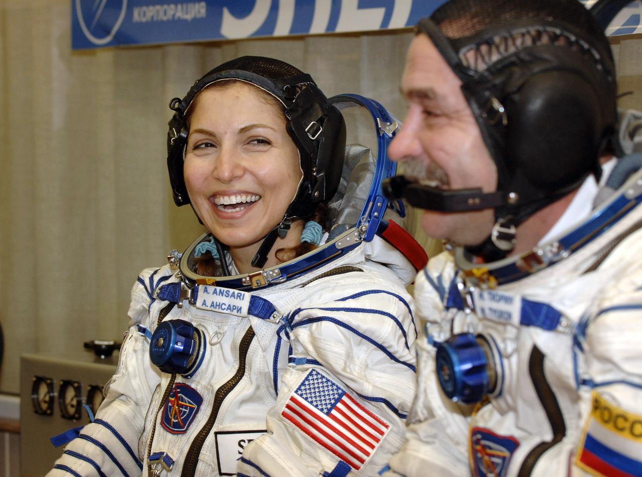 American spaceflight participant Anousheh Ansari and Expedition 14 Flight Engineer Mikhail Tyurin share a laugh as they prepare for pressure checks on their Russian Sokol suits at the Baikonur Cosmodrome, Monday, Sept. 18, 2006, in Kazakhstan.  The Soyuz TMA-9 spacecraft launched from the Baikonur Cosmodrome at 10:09 a.m. local time carrying Expedition 14 Commander Michael Lopez-Alegria, Soyuz Commander and Expedition 14 Flight Engineer Mikhail Tyurin and American spaceflight participant Anousheh Ansari, who will spend nine days on the International Space Station under a commercial agreement with the Russian Federal Space Agency.  Photo Credit: (NASA/Bill Ingalls)