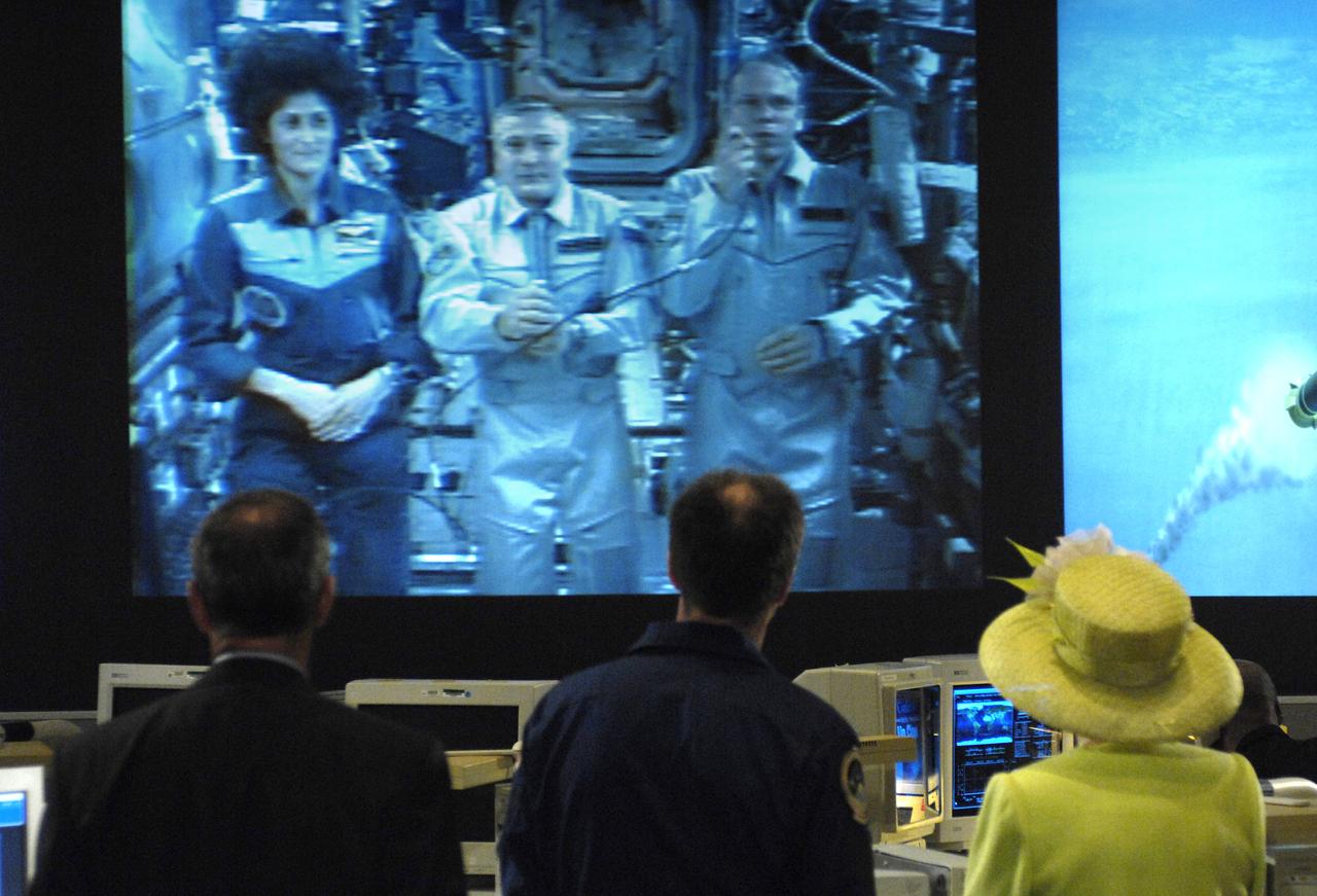 Queen Elizabeth II, lower right, talks to Expedition 15 crew members from left, NASA astronaut, Sunita Williams, Russian cosmonaut Fyodor N. Yurchikhin and cosmonaut Oleg V. Kotov aboard the International Space Station crew along with NASA Administrator Michael Griffin, lower left and NASA astronaut Michael Foale during a downlink at the NASA's Goddard Space Flight Center Operational Control Room, Tuesday, May 8, 2007, in Greenbelt, Md. NASA Goddard was one of the last stops on the Queen's six-day visit to the United States. Photo Credit: (NASA/Bill Ingalls)