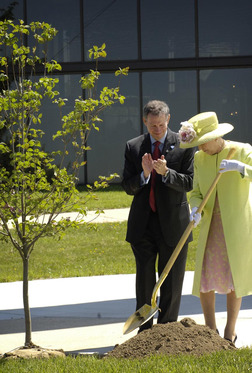 Queen Elizabeth II and NASA Administrator Michael Griffin plant a commemorative tree on the grounds of the visitor's center during a visit to NASA's Goddard Space Flight Center, Tuesday, May 8, 2007, in Greenbelt, Md. The Royal couple's appearance was one of the last stops on a six-day visit to the United States. Photo Credit (NASA/Debbie McCallum)