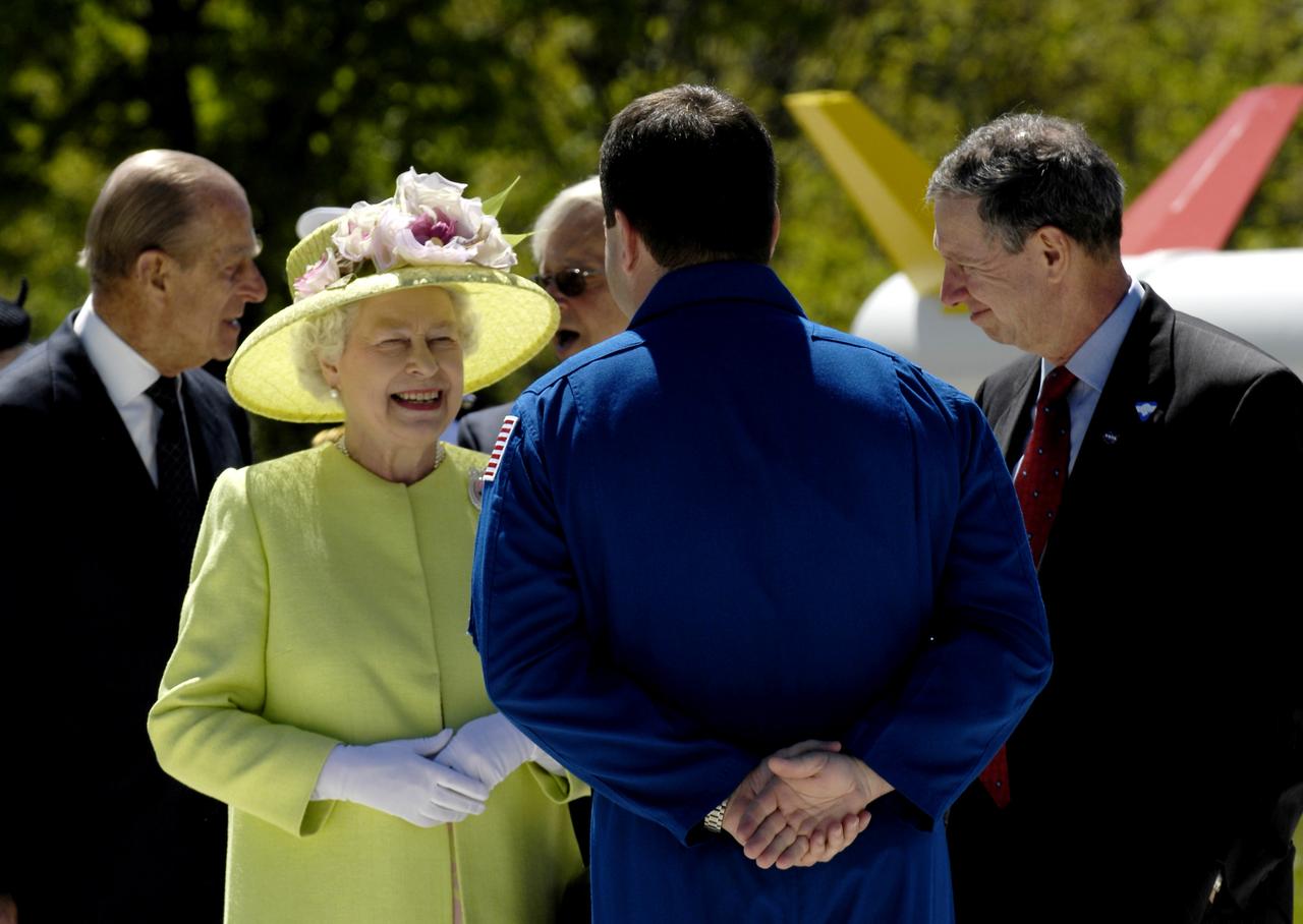 Queen Elizabeth II speaks with STS-116 astronaut Nicholas Patrick, back to camera, as NASA Administrator Michael Griffin, right, looks on at the NASA's Goddard Space Flight Center, Wednesday, May 8, 2007, in Greenbelt, Md. The Royal couple's appearance was one of the last stops on a six-day visit to the United States. Photo Credit (NASA/Paul E. Alers)