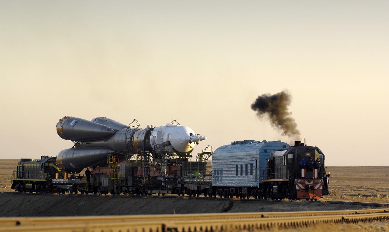 The Soyuz TMA-11 spacecraft is transported by railcar to its launch pad at the Baikonur Cosmodrome, Monday, Oct. 8, 2007, in Kazakhstan for an October 10th launch date. The Soyuz will carry Expedition 16 Commander Peggy Whitson, Flight Engineer and Soyuz Commander Yuri Malenchenko and Malaysian spaceflight participant Sheikh Muszaphar Shukor to the International Space Station. Whitson and Malenchenko will spend six months on the station. Shukor, who is flying under an agreement between Malaysia and the Russian Federal Space Agency, will return to Earth October 21 with two of the Expedition 15 crew members currently on the complex. Photo Credit: (NASA/Bill Ingalls)