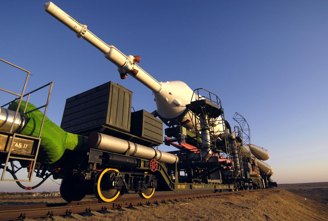 The Soyuz TMA-11 spacecraft is transported by railcar to its launch pad at the Baikonur Cosmodrome, Monday, Oct. 8, 2007, in Kazakhstan for an October 10th launch date.  The Soyuz will carry Expedition 16 Commander Peggy Whitson, Flight Engineer and Soyuz Commander Yuri Malenchenko and Malaysian spaceflight participant Sheikh Muszaphar Shukor to the International Space Station.  Whitson and Malenchenko will spend six months on the station.  Shukor, who is flying under an agreement between Malaysia and the Russian Federal Space Agency, will return to Earth October 21 with two of the Expedition 15 crew members currently on the complex.  Photo Credit:  (NASA/Bill Ingalls)