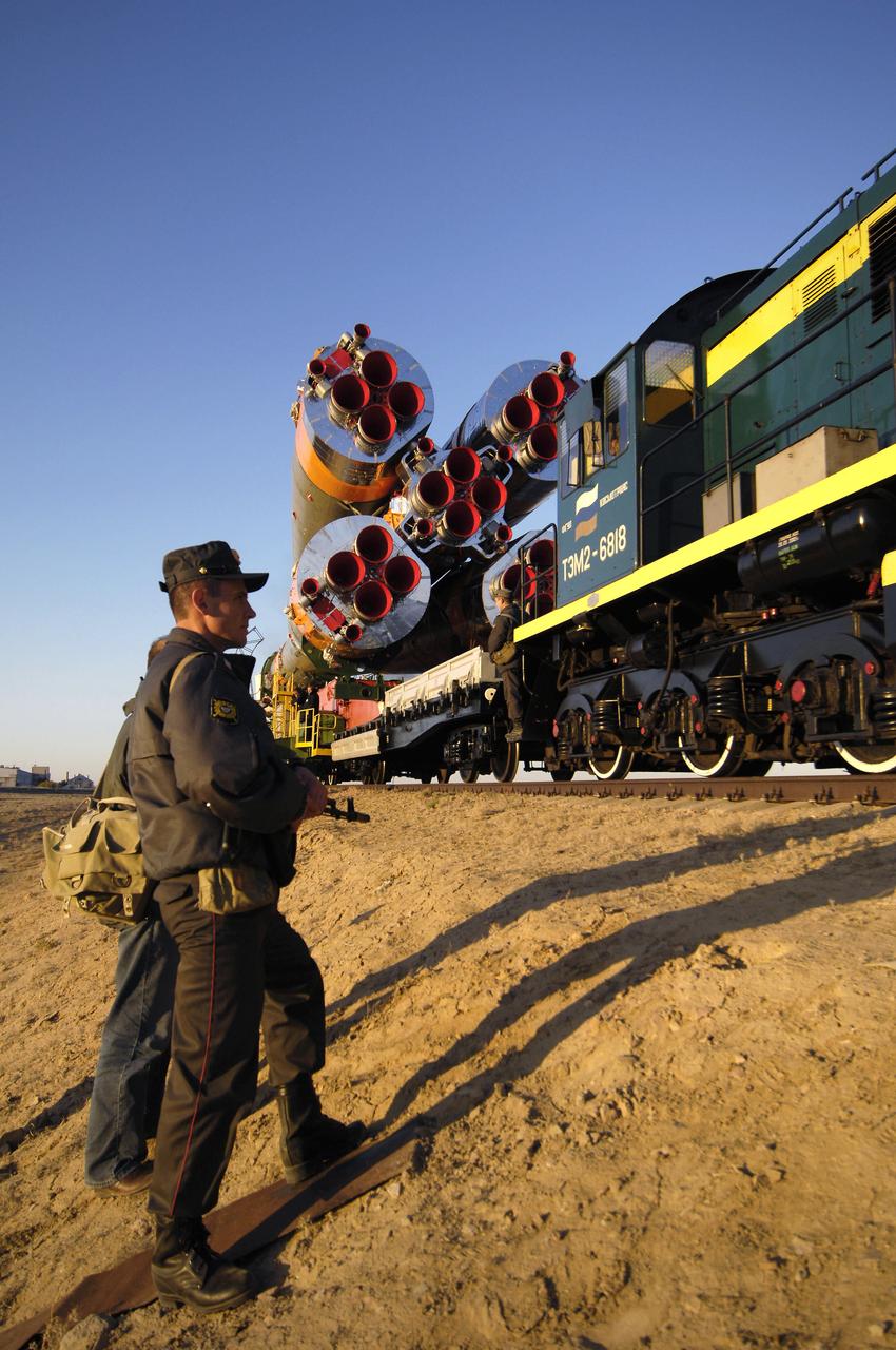 The Soyuz TMA-11 spacecraft is transported by railcar to its launch pad at the Baikonur Cosmodrome, Monday, Oct. 8, 2007, in Kazakhstan for an October 10th launch date.  The Soyuz will carry Expedition 16 Commander Peggy Whitson, Flight Engineer and Soyuz Commander Yuri Malenchenko and Malaysian spaceflight participant Sheikh Muszaphar Shukor to the International Space Station.  Whitson and Malenchenko will spend six months on the station.  Shukor, who is flying under an agreement between Malaysia and the Russian Federal Space Agency, will return to Earth October 21 with two of the Expedition 15 crew members currently on the complex.  Photo Credit:  (NASA/Bill Ingalls)