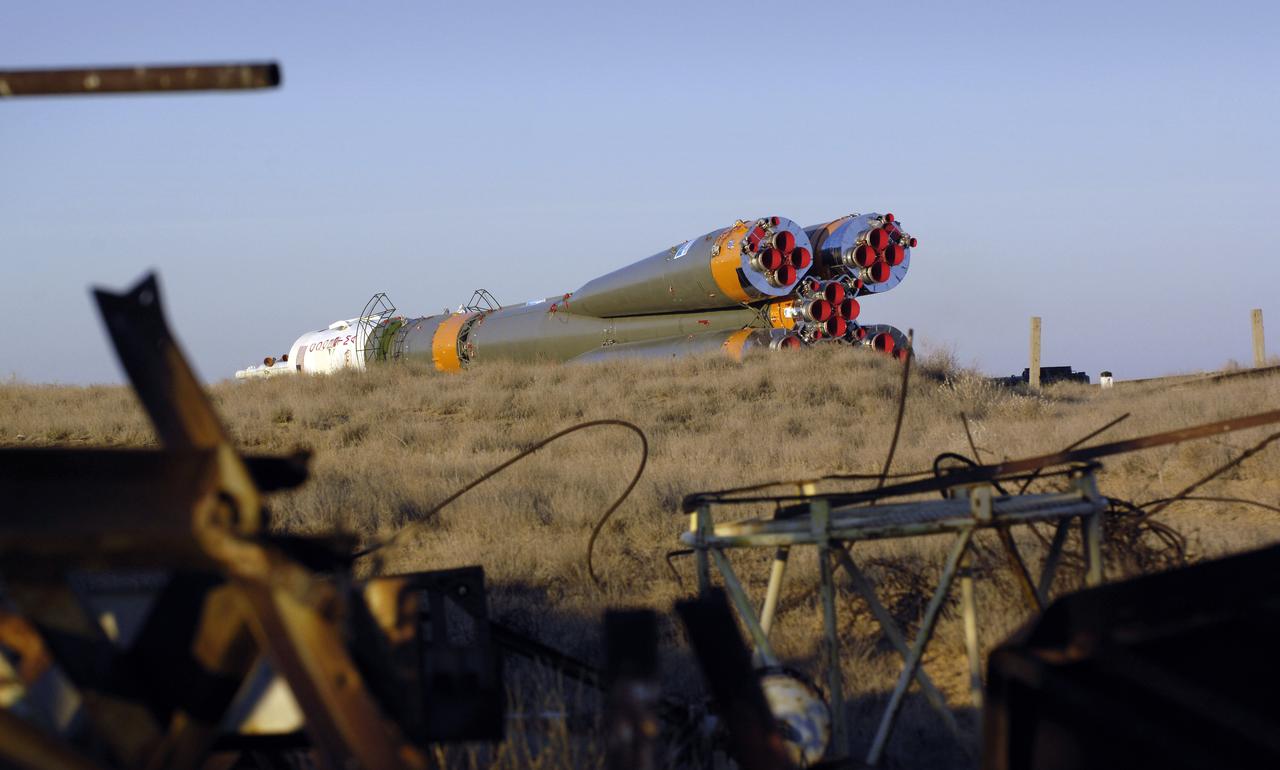 The Soyuz TMA-11 spacecraft is transported by railcar to its launch pad at the Baikonur Cosmodrome, Monday, Oct. 8, 2007, in Kazakhstan for an October 10th launch date.  The Soyuz will carry Expedition 16 Commander Peggy Whitson, Flight Engineer and Soyuz Commander Yuri Malenchenko and Malaysian spaceflight participant Sheikh Muszaphar Shukor to the International Space Station.  Whitson and Malenchenko will spend six months on the station.  Shukor, who is flying under an agreement between Malaysia and the Russian Federal Space Agency, will return to Earth October 21 with two of the Expedition 15 crew members currently on the complex.  Photo Credit:  (NASA/Bill Ingalls)
