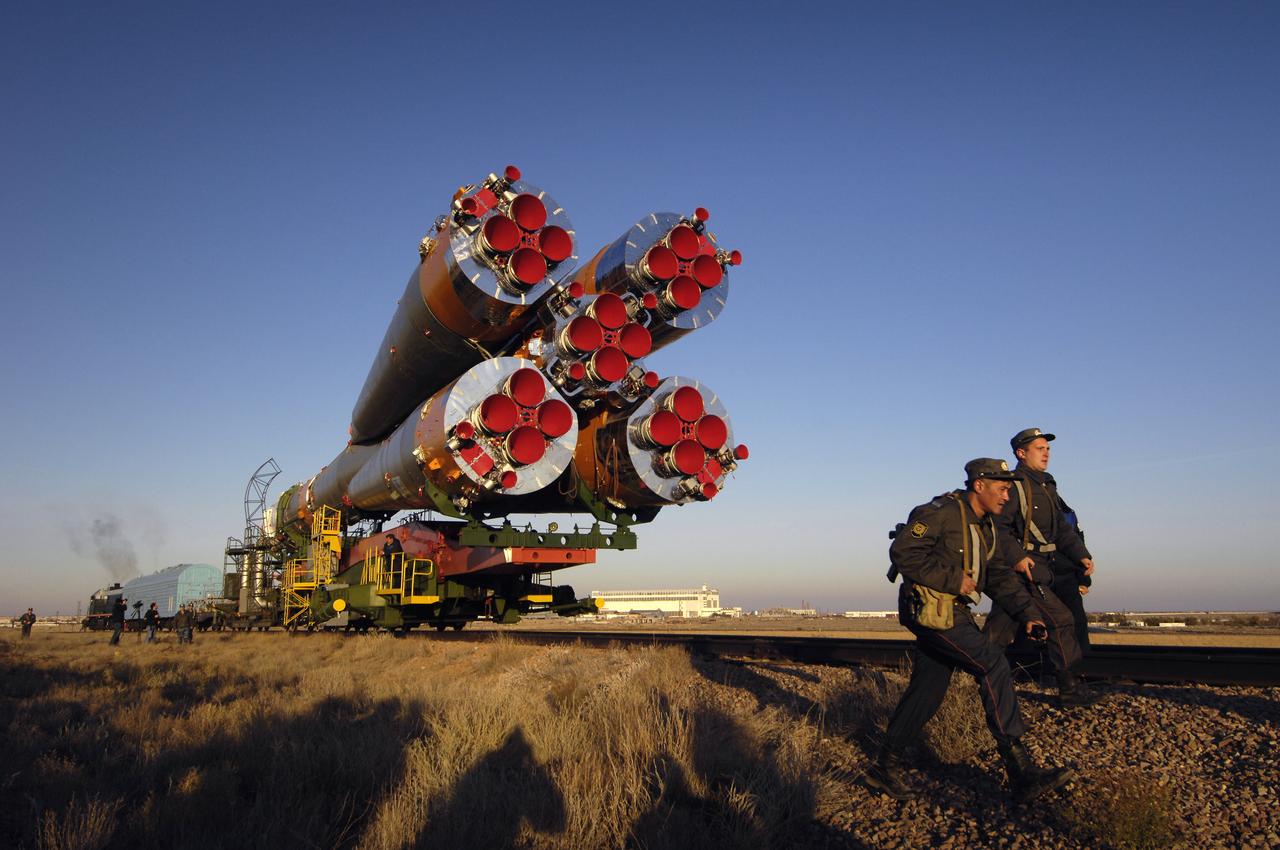 The Soyuz TMA-11 spacecraft is transported by railcar to its launch pad at the Baikonur Cosmodrome, Monday, Oct. 8, 2007, in Kazakhstan for an October 10th launch date. The Soyuz will carry Expedition 16 Commander Peggy Whitson, Flight Engineer and Soyuz Commander Yuri Malenchenko and Malaysian spaceflight participant Sheikh Muszaphar Shukor to the International Space Station. Whitson and Malenchenko will spend six months on the station. Shukor, who is flying under an agreement between Malaysia and the Russian Federal Space Agency, will return to Earth October 21 with two of the Expedition 15 crew members currently on the complex. Photo Credit: (NASA/Bill Ingalls)