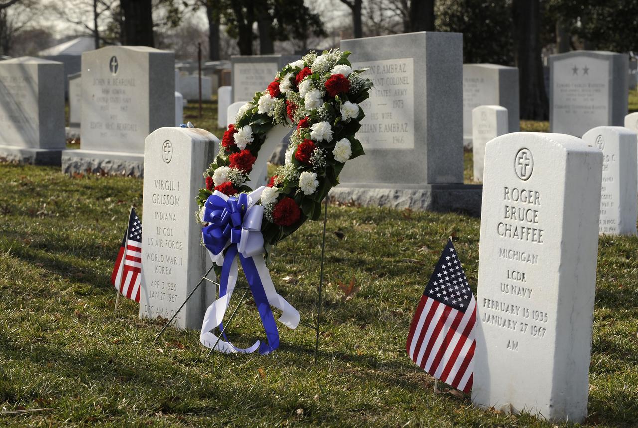 A wreath placed by NASA Deputy Administrator Shana Dale and other NASA senior management is seen in between Astronauts Virgil Grissom and Roger Chaffee memorials Thursday, Jan. 31, 2008, at Arlington National Cemetery.  The wreath laying ceremony is part of NASA's Day of Remembrance. Wreaths were laid in the memory of those men and women who lost their lives in the quest of space exploration, including the astronaut crews of Columbia, Challenger and Apollo 1. Photo Credit: (NASA/Bill Ingalls)