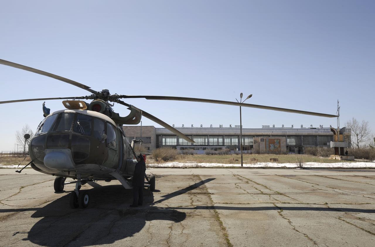 A Russian Search and Rescue helicopter waits for refueling at the Arkalyk airport in Kazakhstan prior to taking off for the landing of the Soyuz TMA-11 spacecraft carrying Expedition 16 Commander Peggy Whitson, Flight Engineer and Soyuz Commander Yuri Malenchenko and South Korean spaceflight participant So-yeon Yi, Friday, April, 19, 2008. The Soyuz made a ballistic landing, touching down more then 400 kilometers short of the intended target in central Kazakhstan. Photo Credit: (NASA/Bill Ingalls)