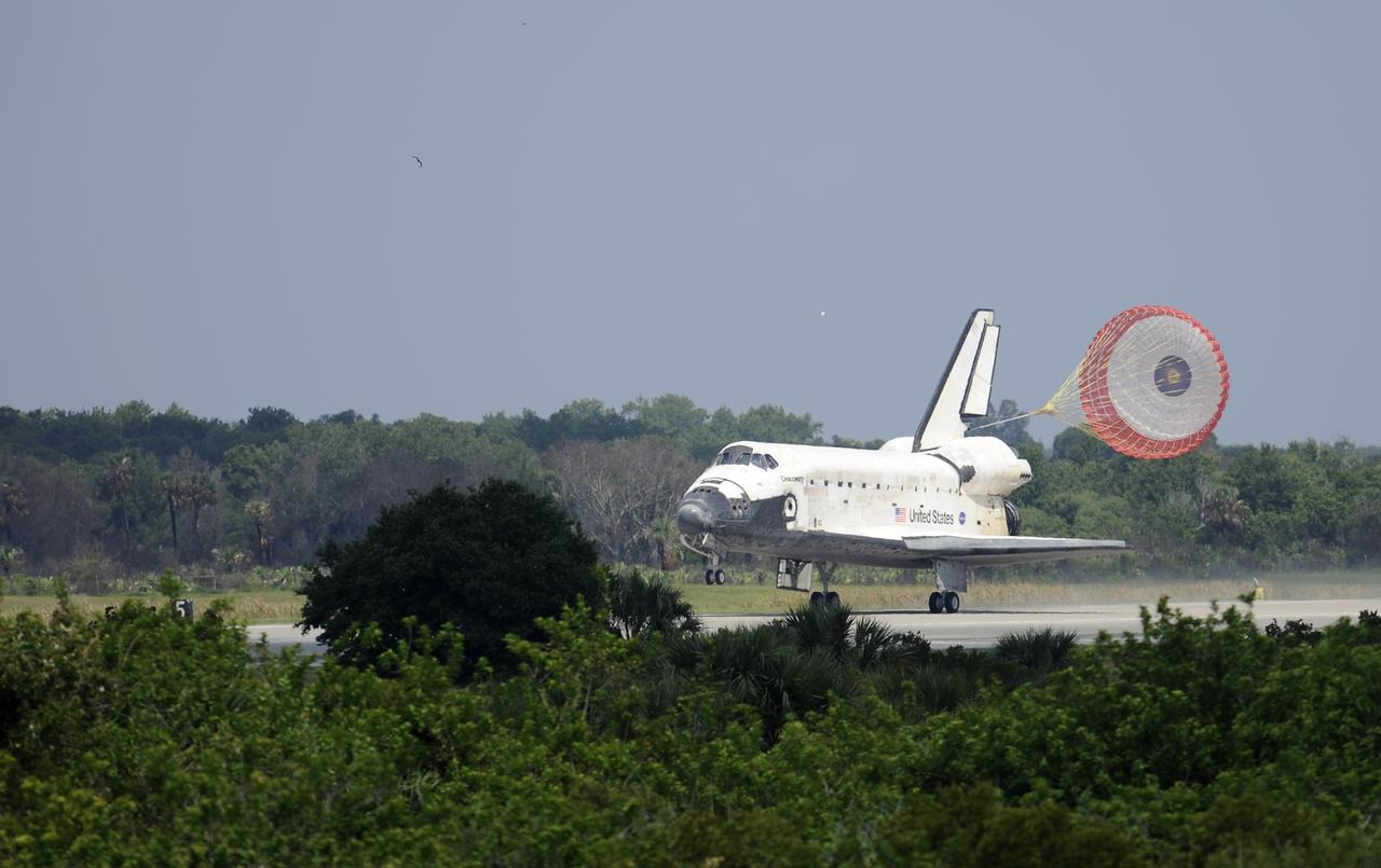 The space shuttle Discovery, STS-124 mission, touches down on runway 15 of the NASA Kennedy Space Center Shuttle Landing Facility at 11:15 a.m., Saturday, June 14, 2008 in Cape Canaveral, Florida. Onboard are NASA astronauts Mark Kelly, commander; Ken Ham, pilot; Mike Fossum, Ron Garan, Karen Nyberg, Garrett Reisman and Japan Aerospace Exploration Agency astronaut Akihiko Hoshide, all mission specialists. During the mission, Discovery's crew installed the Japan Aerospace Exploration Agency's large Kibo laboratory and its remote manipulator system leaving a larger space station and one with increased science capabilities.  Photo Credit: (NASA/Bill Ingalls)