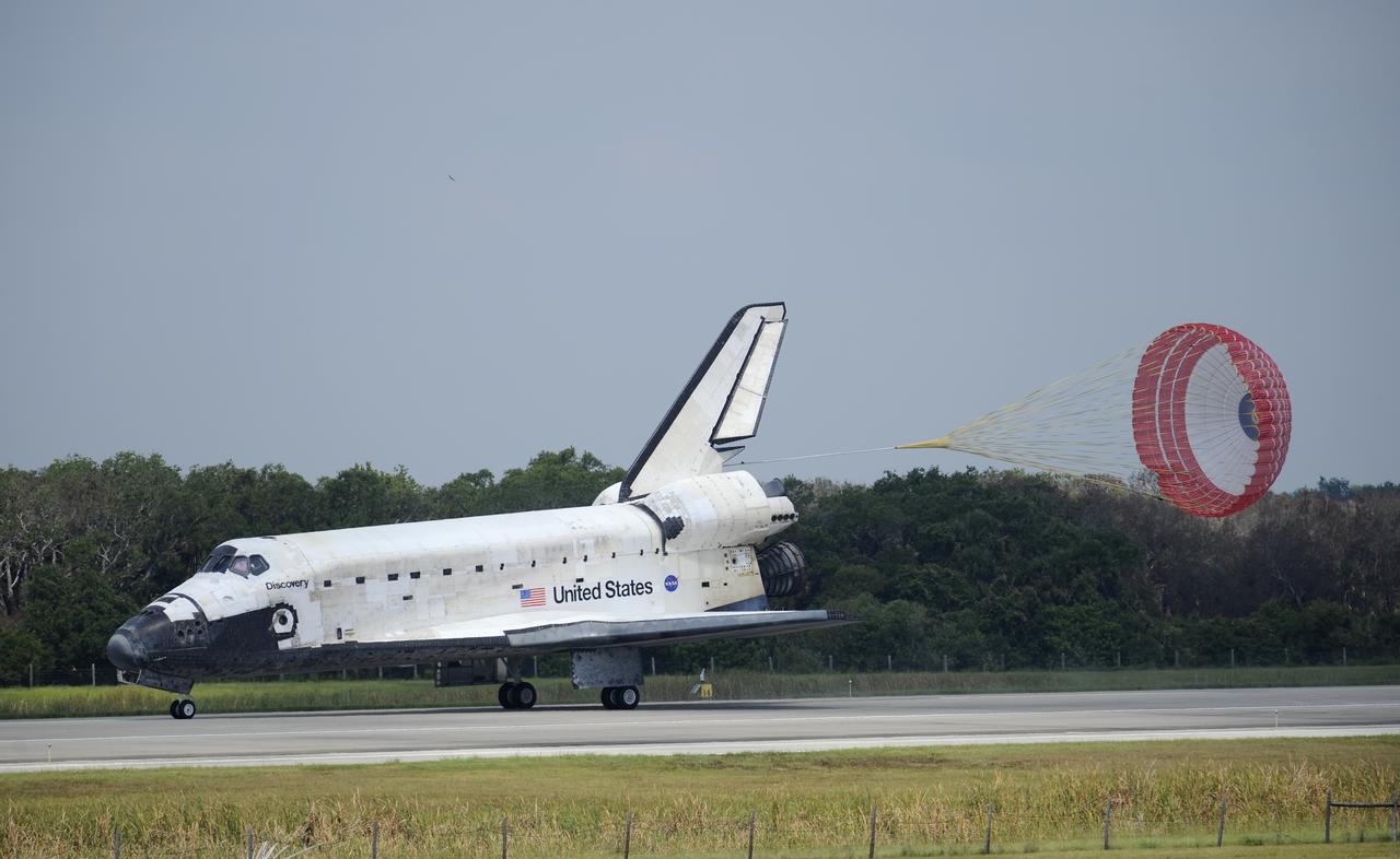 The space shuttle Discovery, STS-124 mission, touches down on runway 15 of the NASA Kennedy Space Center Shuttle Landing Facility at 11:15 a.m., Saturday, June 14, 2008 in Cape Canaveral, Florida. Onboard are NASA astronauts Mark Kelly, commander; Ken Ham, pilot; Mike Fossum, Ron Garan, Karen Nyberg, Garrett Reisman and Japan Aerospace Exploration Agency astronaut Akihiko Hoshide, all mission specialists. During the mission, Discovery's crew installed the Japan Aerospace Exploration Agency's large Kibo laboratory and its remote manipulator system leaving a larger space station and one with increased science capabilities.  Photo Credit: (NASA/Bill Ingalls)