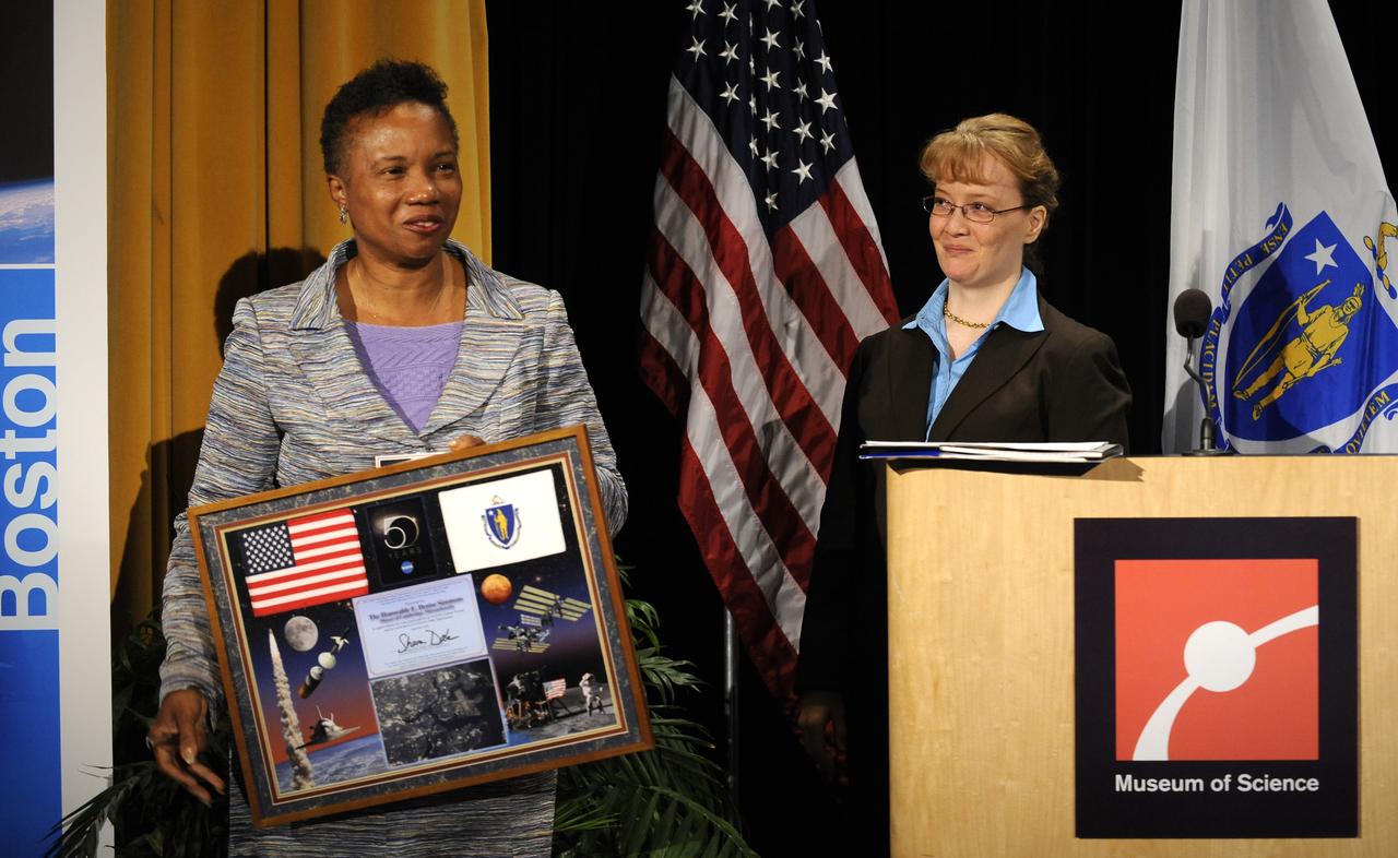 Mayor of Cambridge, Massachusetts, E. Denise Simmons, left, holds a plaque presented to her by NASA Deputy Administrator Ms. Shana Dale during the NASA Future Forum event at the Museum of Science in Boston, MA, Thursday, September 18, 2008. Photo Credit: (NASA/Bill Ingalls)