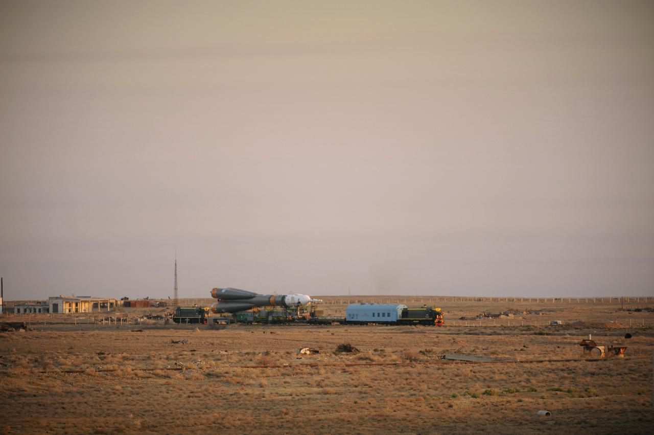 The Soyuz TMA-13 spacecraft is transported by railcar to its launch pad at the Baikonur Cosmodrome in Kazakhstan, Friday, Oct. 10, 2008.  Expedition 18 Commander Michael Fincke, Flight Engineer Yuri V. Lonchakov and American spaceflight participant Richard Garriott will launch October 12 and dock with the International Space Station October 14.  Fincke and Lonchakov will spend six months on the station, while Garriott will return to Earth after 10 days with the Expedition 17 crew members currently on the ISS.  Photo Credit: (NASA/Bill Ingalls)