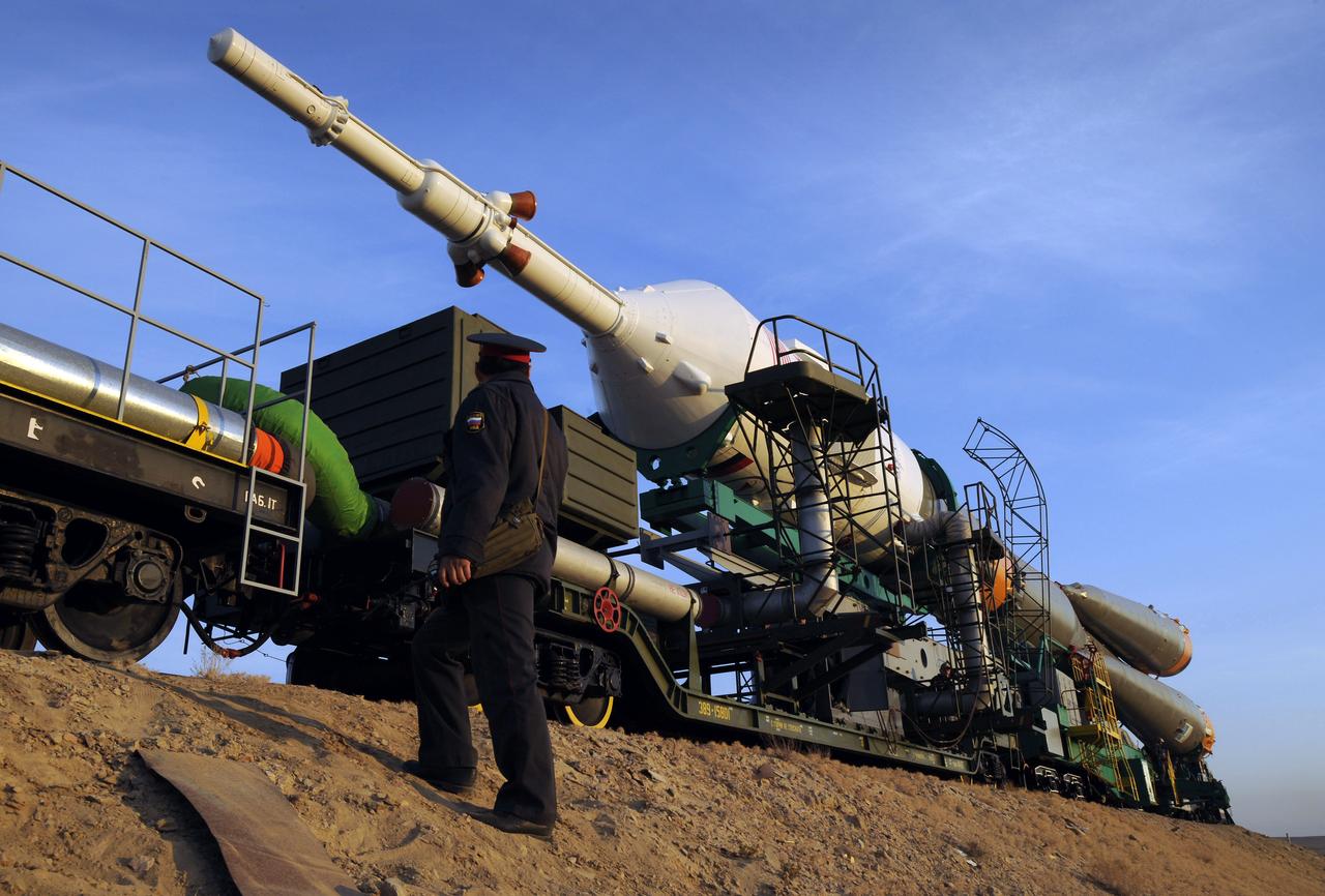The Soyuz TMA-13 spacecraft is transported by railcar to its launch pad at the Baikonur Cosmodrome in Kazakhstan, Friday, Oct. 10, 2008. Expedition 18 Commander Michael Fincke, Flight Engineer Yuri V. Lonchakov and American spaceflight participant Richard Garriott will launch October 12 and dock with the International Space Station October 14. Fincke and Lonchakov will spend six months on the station, while Garriott will return to Earth after 10 days with the Expedition 17 crew members currently on the ISS. Photo Credit: (NASA/Bill Ingalls)