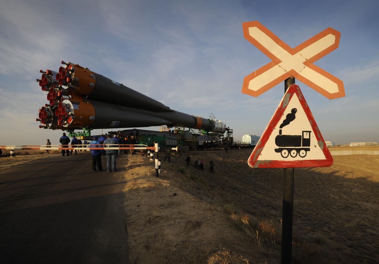 The Soyuz TMA-13 spacecraft is transported by railcar to its launch pad at the Baikonur Cosmodrome in Kazakhstan, Friday, Oct. 10, 2008.  Expedition 18 Commander Michael Fincke, Flight Engineer Yuri V. Lonchakov and American spaceflight participant Richard Garriott will launch October 12 and dock with the International Space Station October 14.  Fincke and Lonchakov will spend six months on the station, while Garriott will return to Earth after 10 days with the Expedition 17 crew members currently on the ISS.  Photo Credit: (NASA/Bill Ingalls)