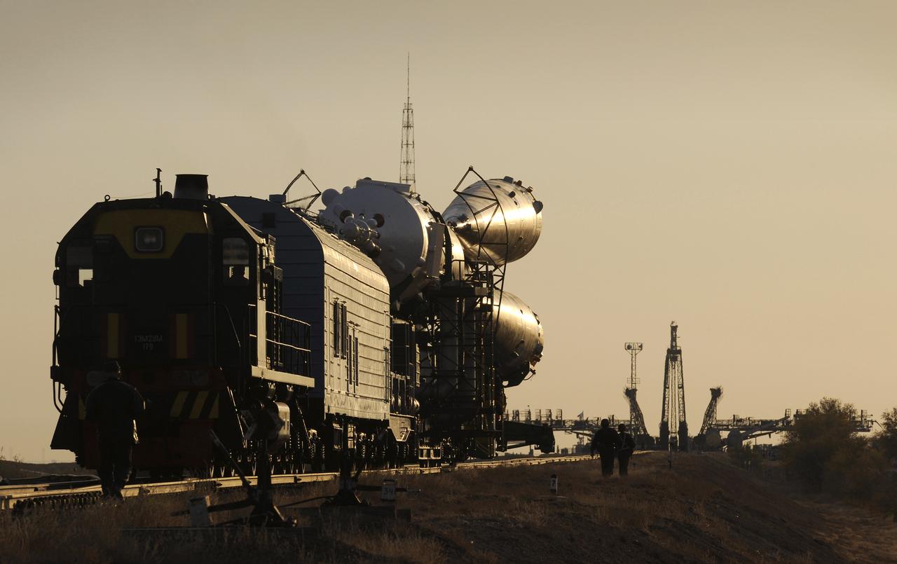 The Soyuz TMA-13 spacecraft is transported by railcar to its launch pad at the Baikonur Cosmodrome in Kazakhstan, Friday, Oct. 10, 2008.  Expedition 18 Commander Michael Fincke, Flight Engineer Yuri V. Lonchakov and American spaceflight participant Richard Garriott will launch October 12 and dock with the International Space Station October 14.  Fincke and Lonchakov will spend six months on the station, while Garriott will return to Earth after 10 days with the Expedition 17 crew members currently on the ISS.  Photo Credit: (NASA/Bill Ingalls)