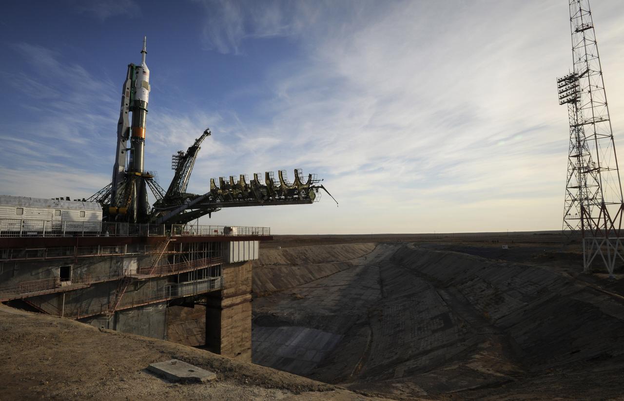 The Soyuz TMA-13 spacecraft arrives at the launch pad at the Baikonur Cosmodrome in Kazakhstan, Friday, Oct. 10, 2008.   The Soyuz is scheduled to launch to the International Space Station Oct. 12 with Expedition 18 Commander Michael Fincke, Flight Engineer Yuri V. Lonchakov and American spaceflight participant Richard Garriott.  The three crew members will dock their Soyuz to the International Space Station on Oct. 14.  Fincke and Lonchakov will spend six months on the station, while Garriott will return to Earth Oct. 24 with two of the Expedition 17 crew members currently on the International Space Station.  Photo Credit: (NASA/Bill Ingalls)
