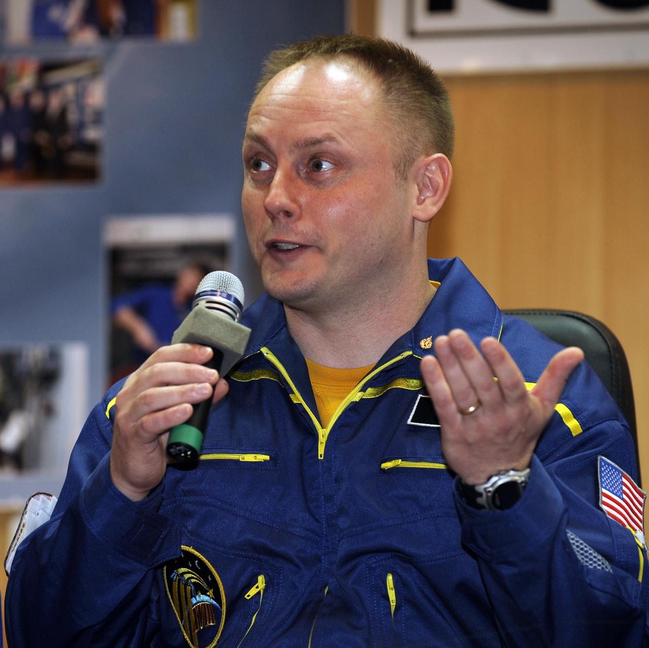 Expedition 18 Commander Michael Fincke answers reporters' questions during a press conference held at the Cosmonaut Hotel, Saturday, Oct. 11, 2008, in Baikonur, Kazakhstan. Fincke will launch on the Soyuz TMA-13 spacecraft along with Expedition 18 Flight Engineer Yuri V. Lonchakov and American spaceflight participant Richard Garriott on Oct. 12 and dock with the International Space Station on Oct. 14. Fincke and Lonchakov will spend six months on the station, while Garriott will return to Earth Oct. 24 with two of the Expedition 17 crew members currently on the International Space Station. Photo Credit: (NASA/Bill Ingalls)