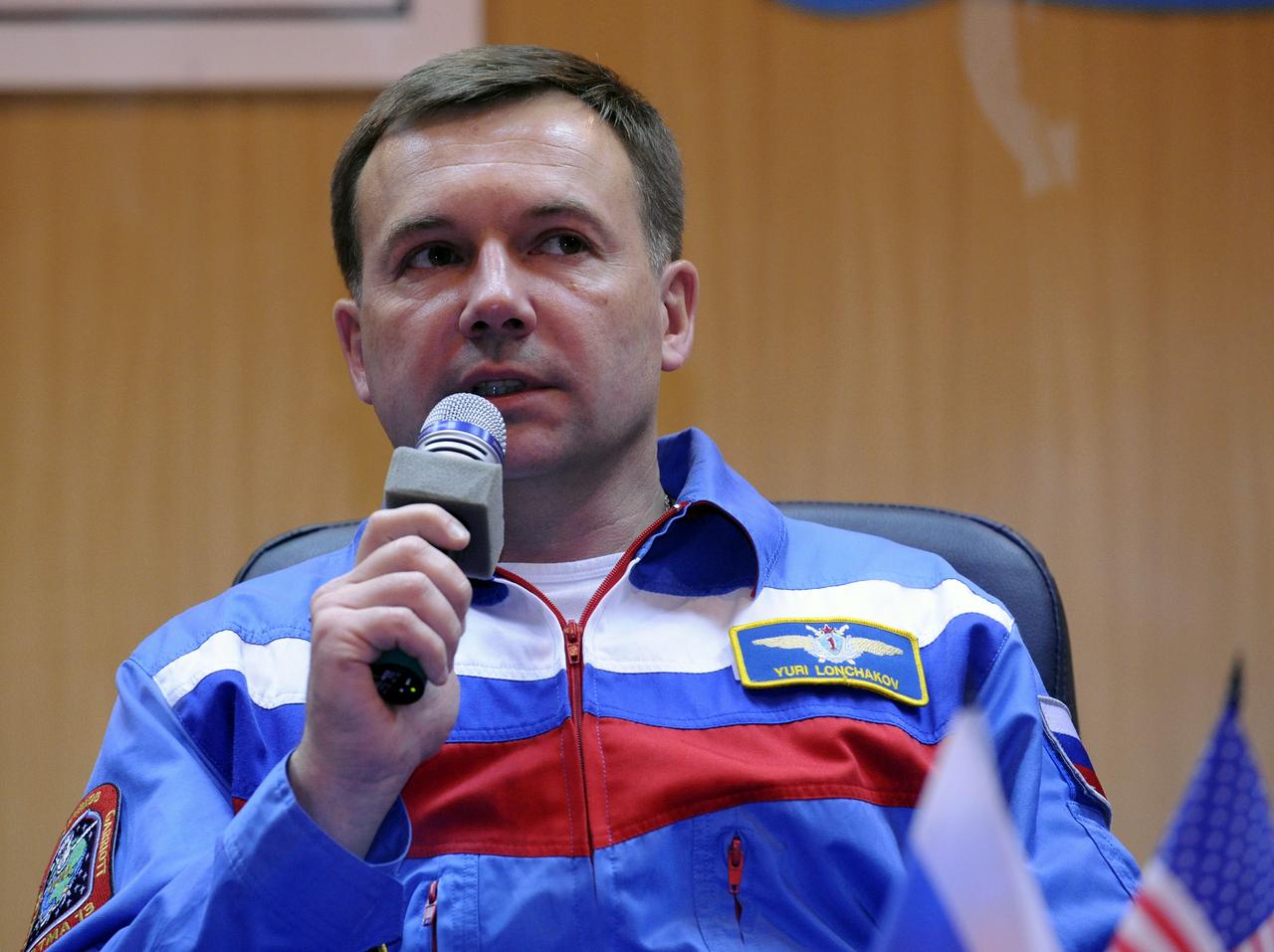 Expedition 18 Flight Engineer Yuri V. Lonchakov answers reporters' questions during a press conference held at the Cosmonaut Hotel, Saturday, Oct. 11, 2008, in Baikonur, Kazakhstan. Lonchakov will launch on the Soyuz TMA-13 spacecraft along with Expedition 18 Commander Michael Fincke and American spaceflight participant Richard Garriott on Oct. 12 and dock with the International Space Station on Oct. 14. Fincke and Lonchakov will spend six months on the station, while Garriott will return to Earth Oct. 24 with two of the Expedition 17 crew members currently on the International Space Station. Photo Credit: (NASA/Bill Ingalls)