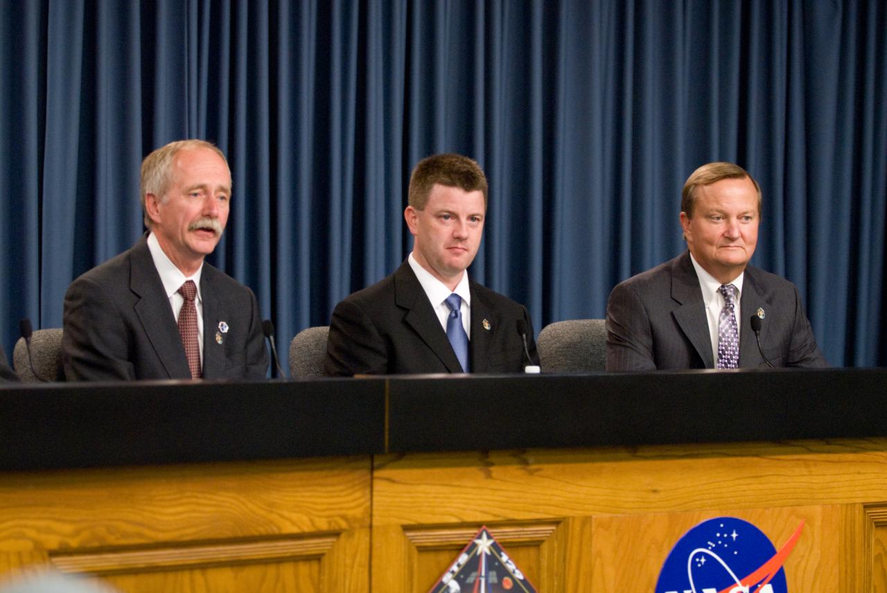 CAPE CANAVERAL, Fla. - A post-launch news conference is held in the NASA Press Site auditorium at NASA's Kennedy Space Center in Florida after the successful launch of space shuttle Atlantis. From left are Bill Gerstenmaier, associate administrator for Space Operations; Mike Moses, chair, Mission Management Team; and Mike Leinbach, space shuttle launch director.   Liftoff of Atlantis on its STS-129 mission came at 2:28 p.m. EST Nov. 16 from Launch Pad 39A.  Aboard are crew members Commander Charles O. Hobaugh; Pilot Barry E. Wilmore; and Mission Specialists Leland Melvin, Randy Bresnik, Mike Foreman and Robert L. Satcher Jr.  On STS-129, the crew will deliver two ExPRESS Logistics Carriers to the International Space Station, the largest of the shuttle's cargo carriers, containing 15 spare pieces of equipment including two gyroscopes, two nitrogen tank assemblies, two pump modules, an ammonia tank assembly and a spare latching end effector for the station's robotic arm.  Atlantis will return to Earth a station crew member, Nicole Stott, who has spent more than two months aboard the orbiting laboratory.  STS-129 is slated to be the final space shuttle Expedition crew rotation flight.  For information on the STS-129 mission and crew, visit http:__www.nasa.gov_mission_pages_shuttle_shuttlemissions_sts129_index.html. Photo credit: NASA_Kim Shiflett