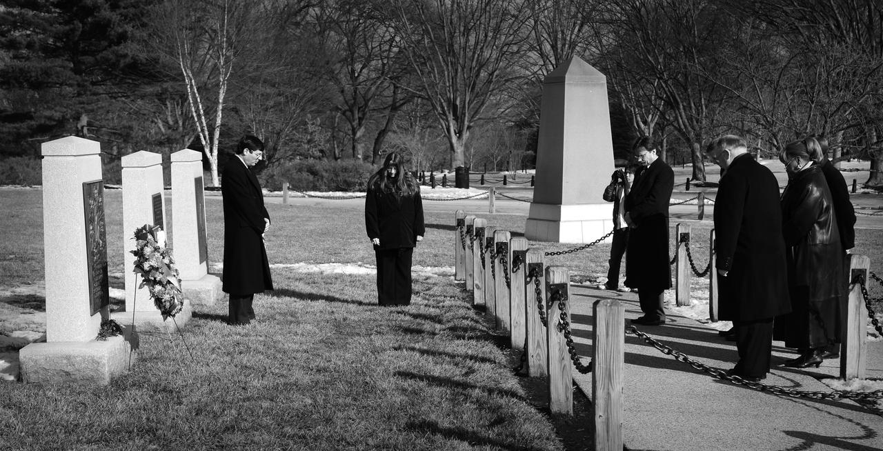 NASA Acting Administrator Christopher Scolese, left, and other NASA senior leaders participate in a wreath laying ceremony as part of NASA's Day of Remembrance, Thursday, Jan. 29, 2009, at Arlington National Cemetery. The wreathes were laid in memory of those men and women who lost their lives in the quest for space exploration. Photo Credit: (NASA/Bill Ingalls)