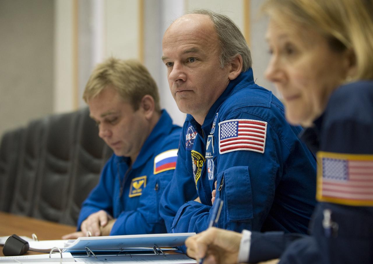 Backup Expedition 19 flight engineer Maxim Suraev, left, backup commander Jeffrey Williams, center, and backup spaceflight participant Esther Dyson participate in training at the Cosmonaut Hotel, Saturday, March 21, 2009 in Baikonur, Kazakhstan. (Photo Credit: NASA/Bill Ingalls)
