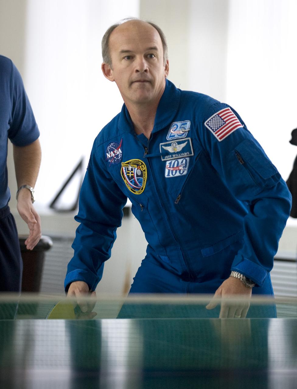 Expedition 19 backup commander Jeffrey Williams plays table tennis at the Cosmonaut Hotel, Saturday, March 21, 2009 in Baikonur, Kazakhstan. (Photo Credit: NASA/Bill Ingalls)