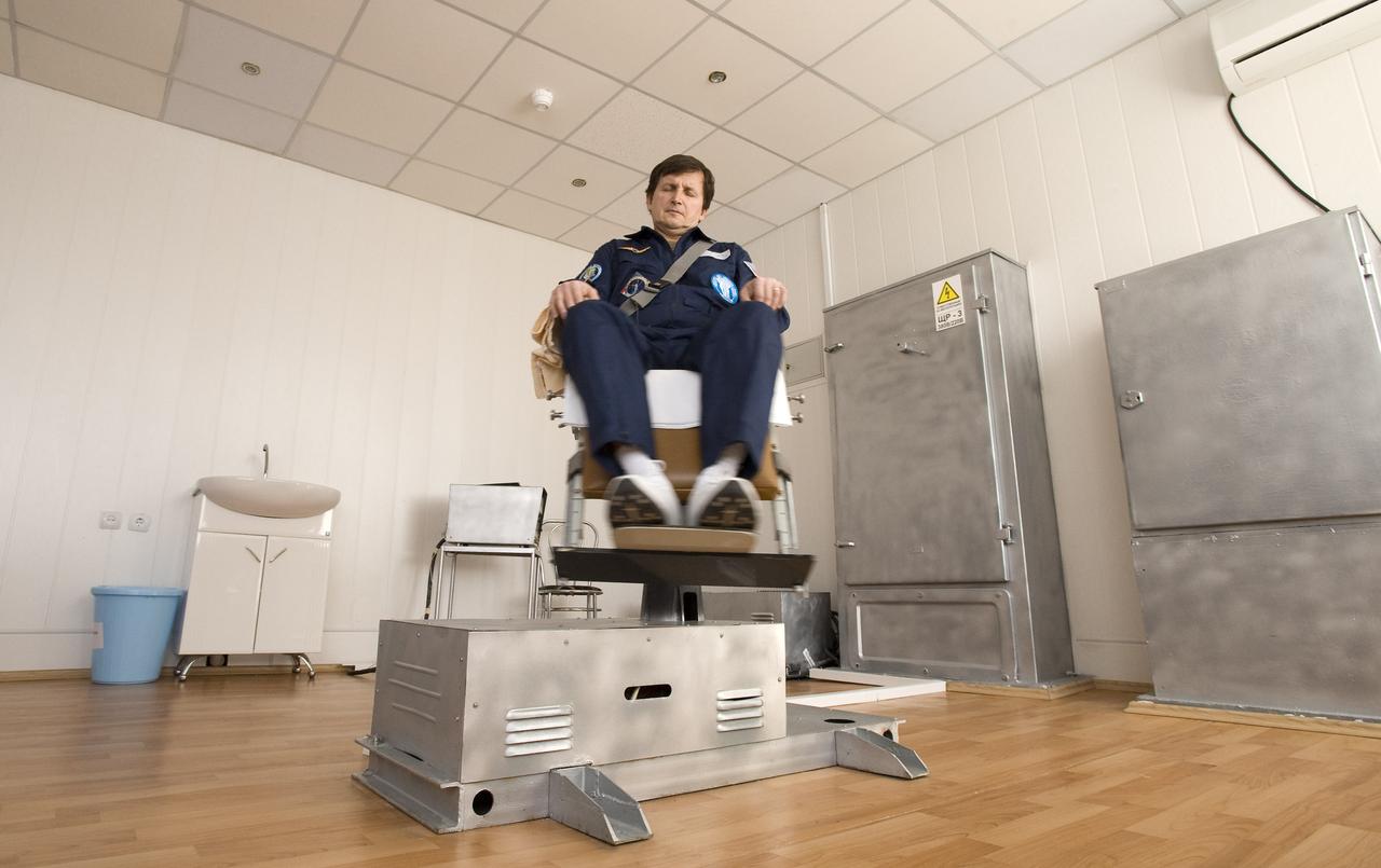 Spaceflight Participant Charles Simonyi participates in the spin chair training at the Cosmonaut Hotel, Saturday, March 21, 2009 in Baikonur, Kazakhstan. (Photo Credit: NASA/Bill Ingalls)
