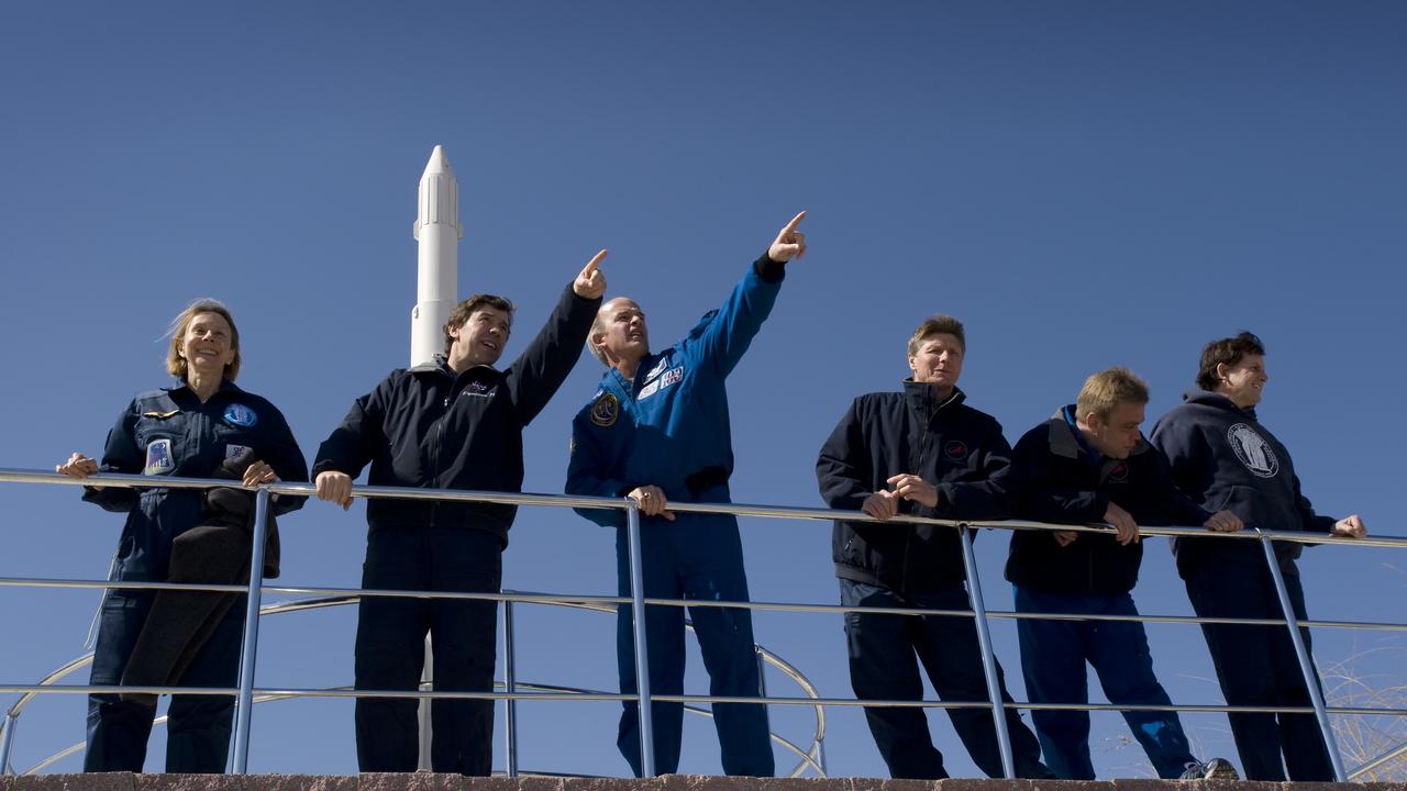 Expedition 19 prime and backup crew from left, backup Spaceflight Participant Esther Dyson, Flight Engineer Michael R. Barratt, Backup Commander Jeffrey Williams, Commander Gennady I. Padalka, backup Flight Engineer Maxim Suraev and Spaceflight Participant Charles Simonyi look at teh view from the Cosmonaut Hotel, Saturday, March 21, 2009 in Baikonur, Kazakhstan.  (Photo Credit: NASA/Bill Ingalls)