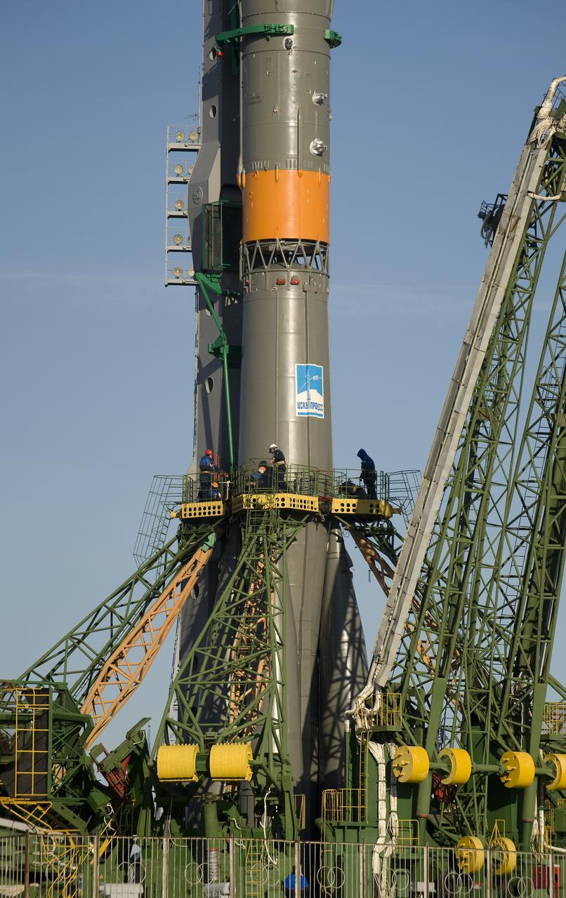 The Soyuz rocket is erected into position at the launch pad Tuesday, March 24, 2009 at the Baikonur Cosmodrome in Kazakhstan. The Soyuz is scheduled to launch the crew of Expedition 19 and a spaceflight participant on March 26, 2009. Photo Credit: (NASA/Bill Ingalls)