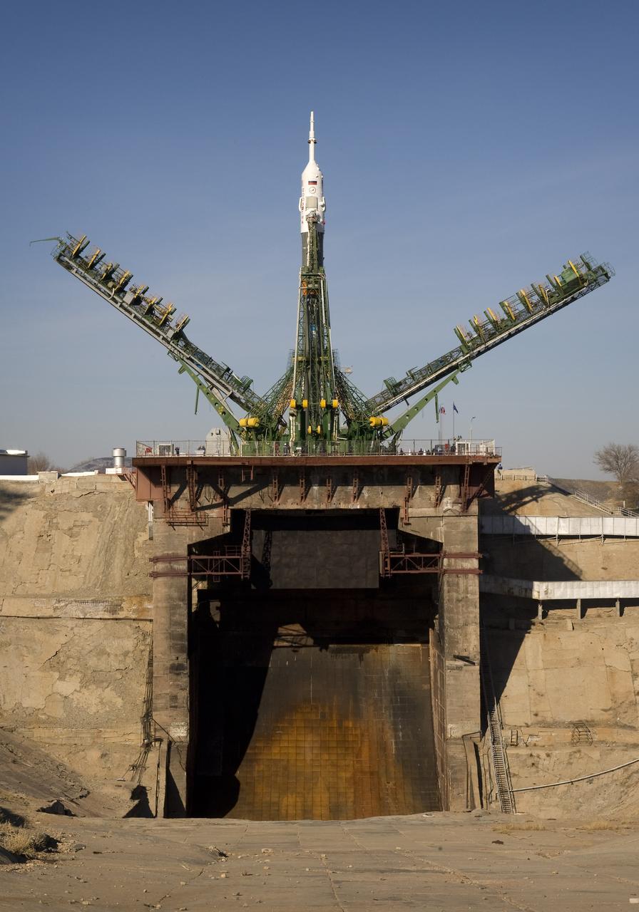 The Soyuz rocket is erected into position at the launch pad Tuesday, March 24, 2009 at the Baikonur Cosmodrome in Kazakhstan. The Soyuz is scheduled to launch the crew of Expedition 19 and a spaceflight participant on March 26, 2009. Photo Credit: (NASA/Bill Ingalls)