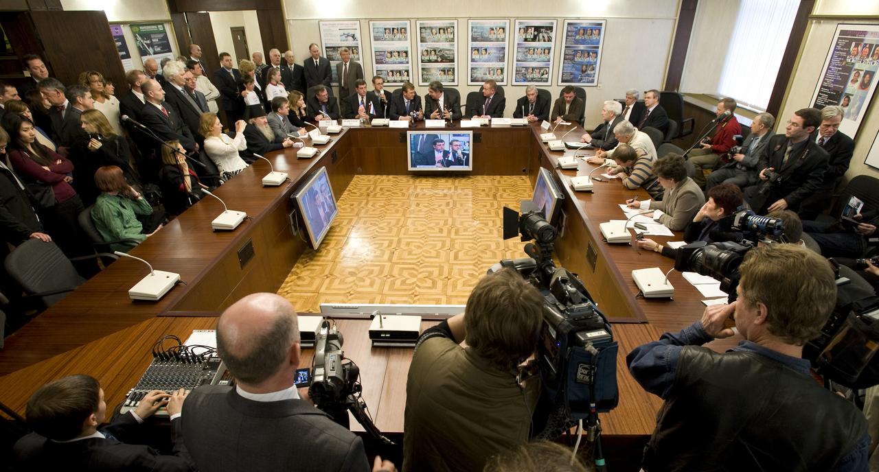 Managers from NASA, Roscosmos, RSC-Energia, TsNIIMash and other related agencies answer reporters questions during a Soyuz post-docking press conference at the Russian mission Control Center in Korolev, Russia on Saturday March 28, 2009. The Soyuz TMA-14 docked to the International Space Station carrying Expedition 19 Commander Gennady I. Padalka, Flight Engineer Michael R. Barratt and Spaceflight Participant Charles Simonyi. Photo Credit: (NASA/Bill Ingalls)