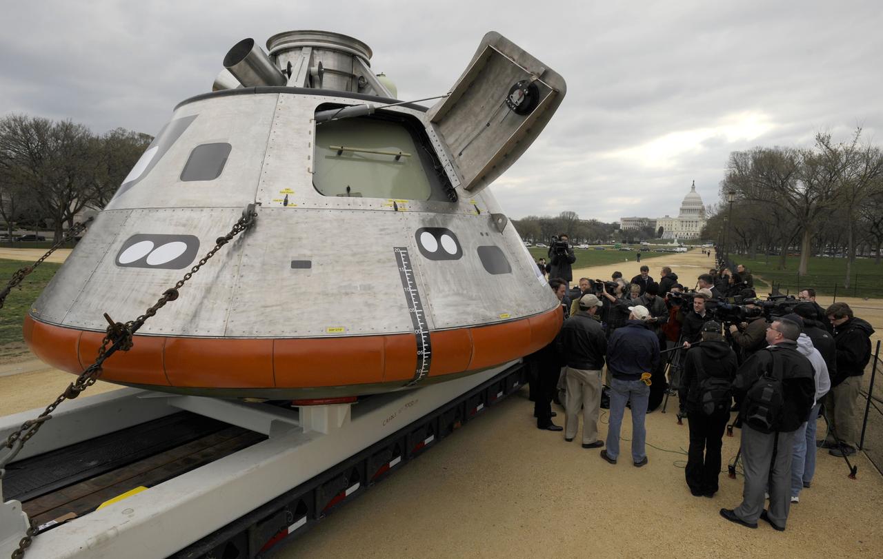 A mock up of the Orion Crew Module is seen, Monday, March 30, 2009, during a news conference on the National Mall in Washington. Orion is the flagship of NASA's programs for space exploration beyond low Earth orbit and a key element of NASA's Constellation Program to explore the Moon, Mars and beyond. Photo Credit: (NASA/Paul. E. Alers)