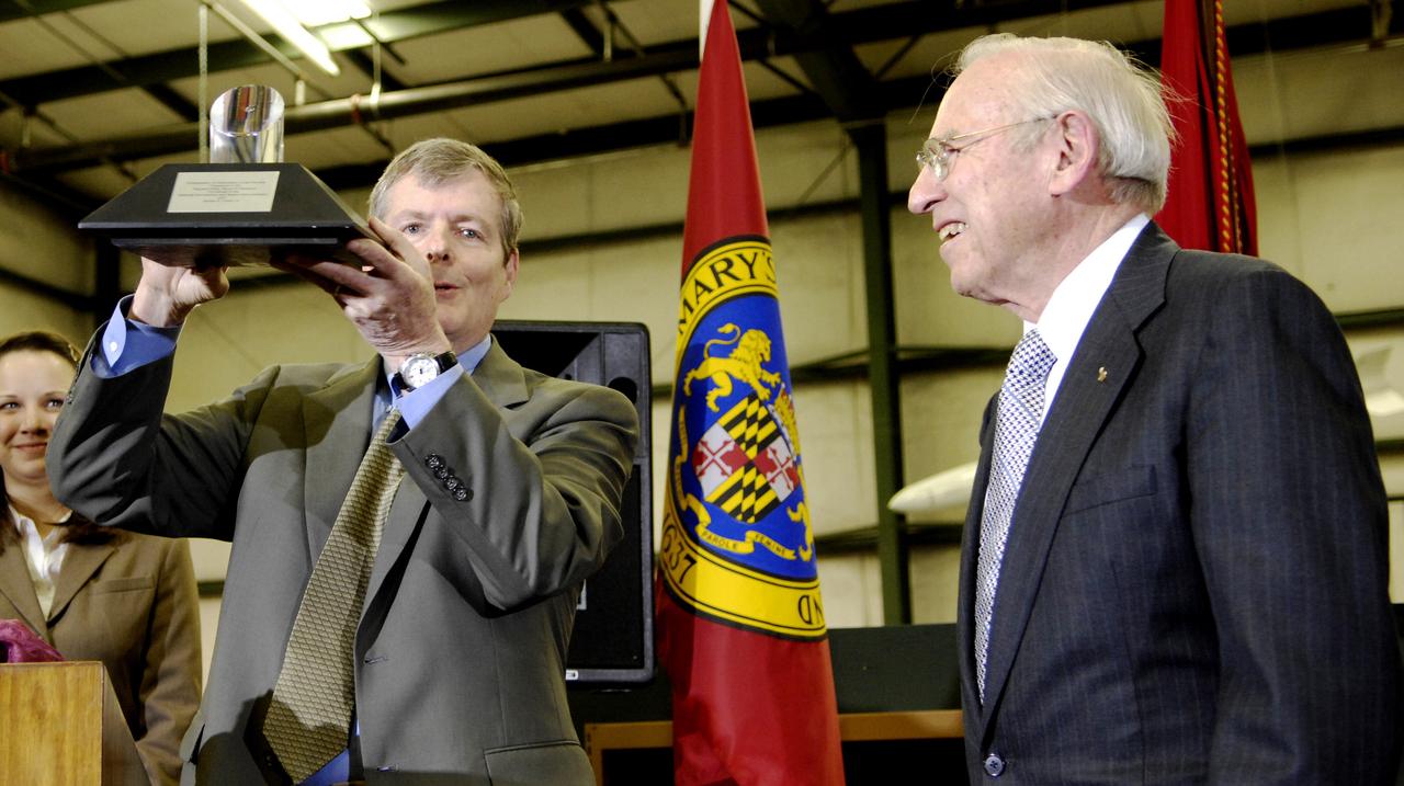 Bryan O'Connor, NASA Associate Administrator, Office of Mission Assurance and Safety, left, presents the Ambassador of Exploration Award to former Apollo astronaut James Lovell, Friday, April 3, 2009, at the Patuxent River Naval Air Museum in Lexington Park, Md. Photo Credit: NASA/Paul E. Alers 