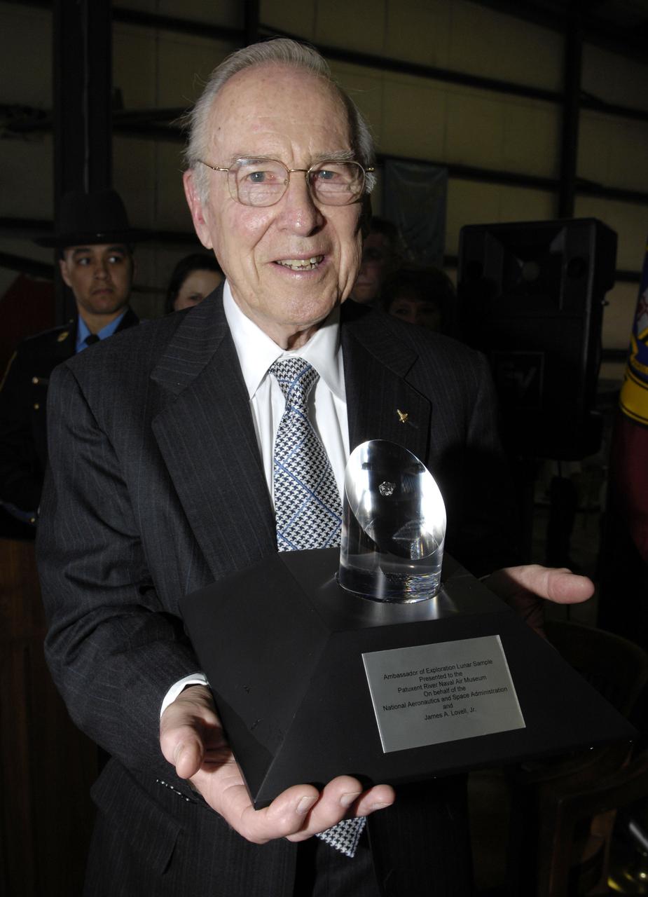 Former Apollo astronaut James Lovell holds his Ambassador of Exploration Award, Friday, April 3, 2009, at the Patuxent River Naval Air Museum in Lexington Park, Md. Photo Credit: NASA/Paul E. Alers