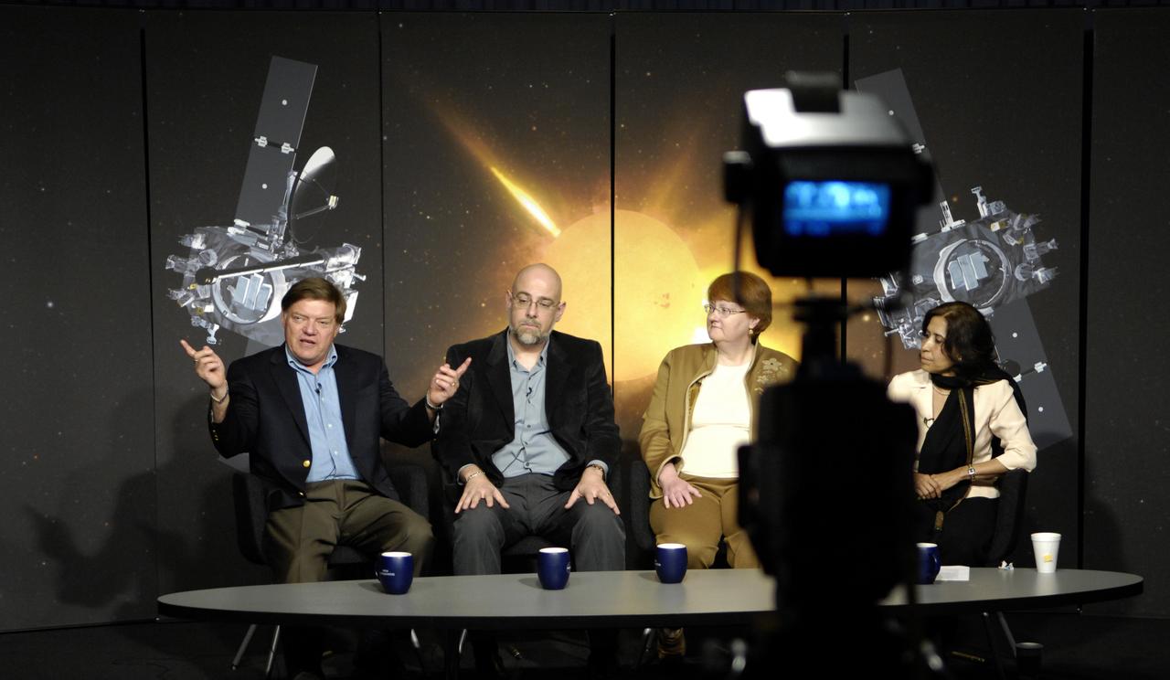 Michael Kaiser, project scientist, Solar Terrestrial Relations Observatory (STEREO) at Goddard Space Flight Center, left, makes a comment during a Science Update on the STEREO mission at NASA Headquarters in Washington, Tuesday, April 14, 2009, as Angelo Vourlidas, project scientist, Sun Earth Connection Coronal and Heliospheric Investigation, at the Naval Research Laboratory, second from left, Toni Galvin, principal investigator, Plasma and Superthermal Ion Composition instrument at the University of New Hampshire and Madhulika Guhathakurta, STEREO program scientist, right, look on. Photo Credit: (NASA/Paul E. Alers)