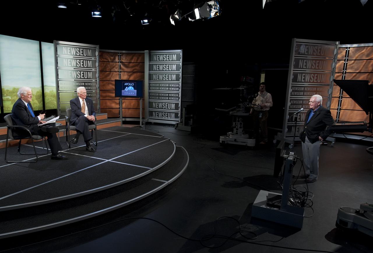 NASA Apollo 10 Astronaut Gene Cernan, on stage, right, and the Newseum's distinguished journalist-in-residence, Nick Clooney, on stage, left, talk with a Stan LeBar, Program Manager of the Apollo TV Lunar Camera who helped see that Apollo 10 was the first mission to broadcast in color from the moon during a Newseum TV program celebrating the 40th anniversary of Apollo 10, Monday, May 18, 2009, in Washington.  Photo Credit (NASA/Bill Ingalls)