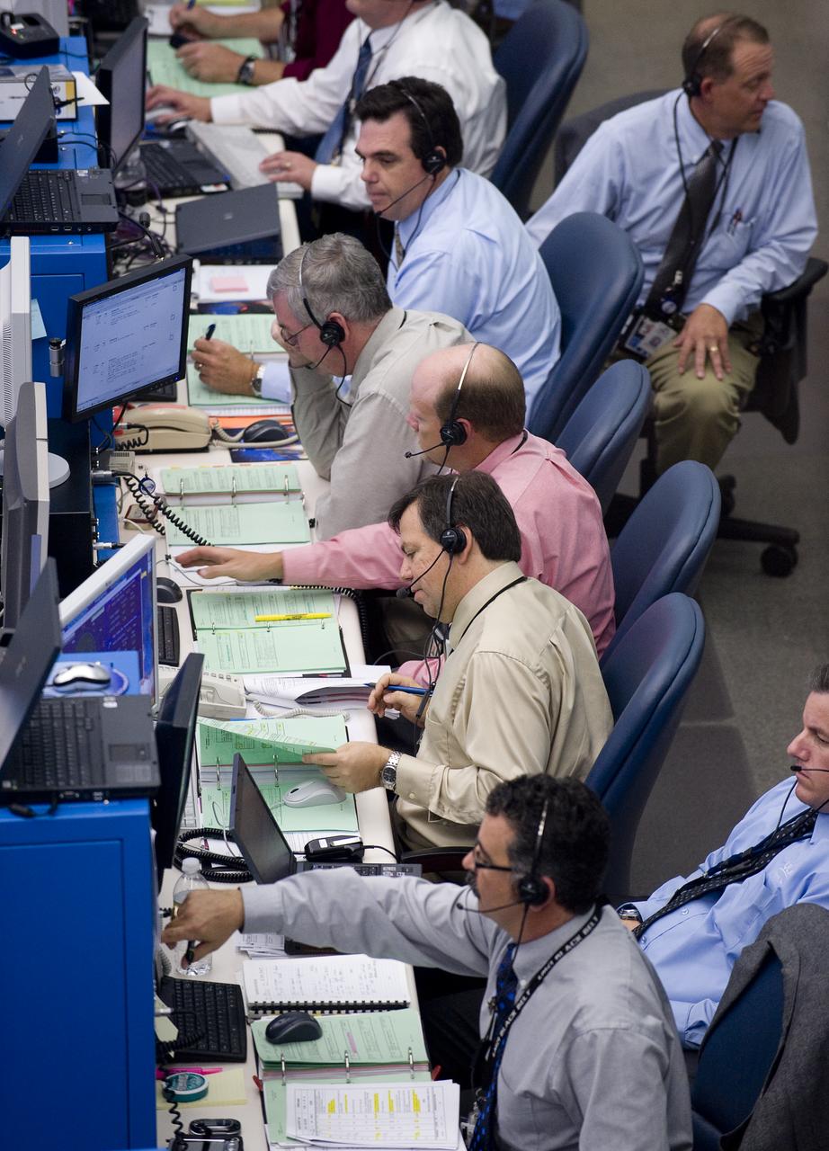 United Launch Alliance (ULA) team members work in the Atlas V Spaceflight Operations Center prior to the launch of the Lunar Reconnaissance Orbiter and Lunar Crater Observation and Sensing Satellite Thursday, June 18, 2009, from Cape Canaveral Air Force Station, Florida. Photo Credit: (NASA/Bill Ingalls)